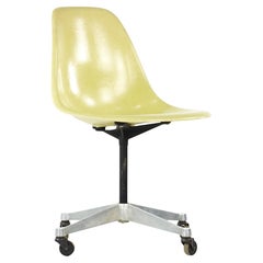 Vintage Charles and Ray Eames for Herman Miller MCM Fiberglass Wheeled Shell Chair