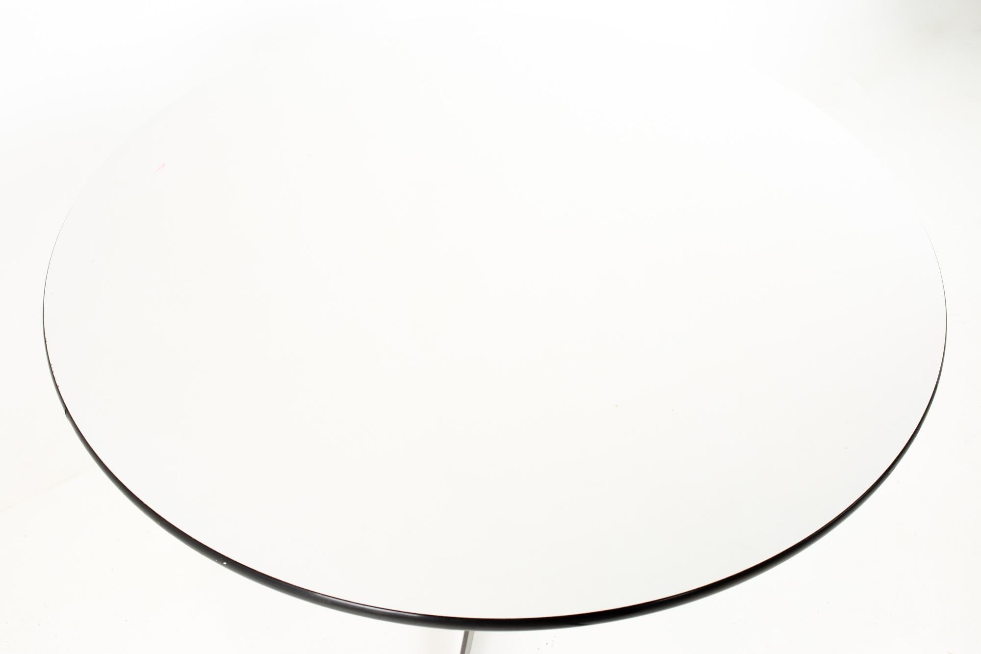 1960s Charles and Ray Eames for Herman Miller midcentury round white laminate dining table
Table measures: 42 wide x 42 deep x 28.5 inches high

Each piece of furniture is available in what we call restored vintage condition. Upon purchase it is