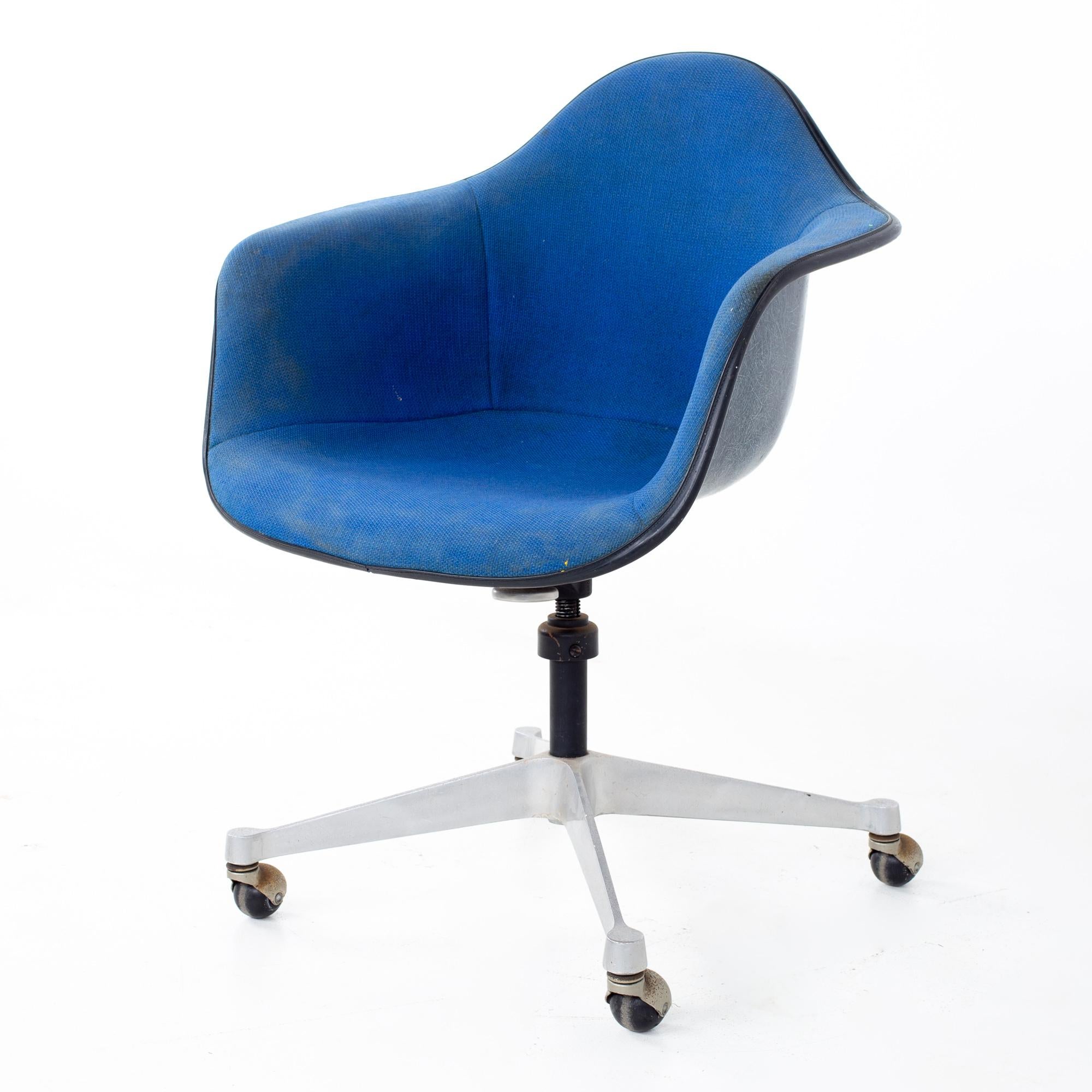 Charles and Ray Eames for Herman Miller mid century blue shell office chair
Chair measures: 25 wide x 22 deep x 34 high, with a seat height of 18 and arm height of 27 inches

All pieces of furniture can be had in what we call restored vintage