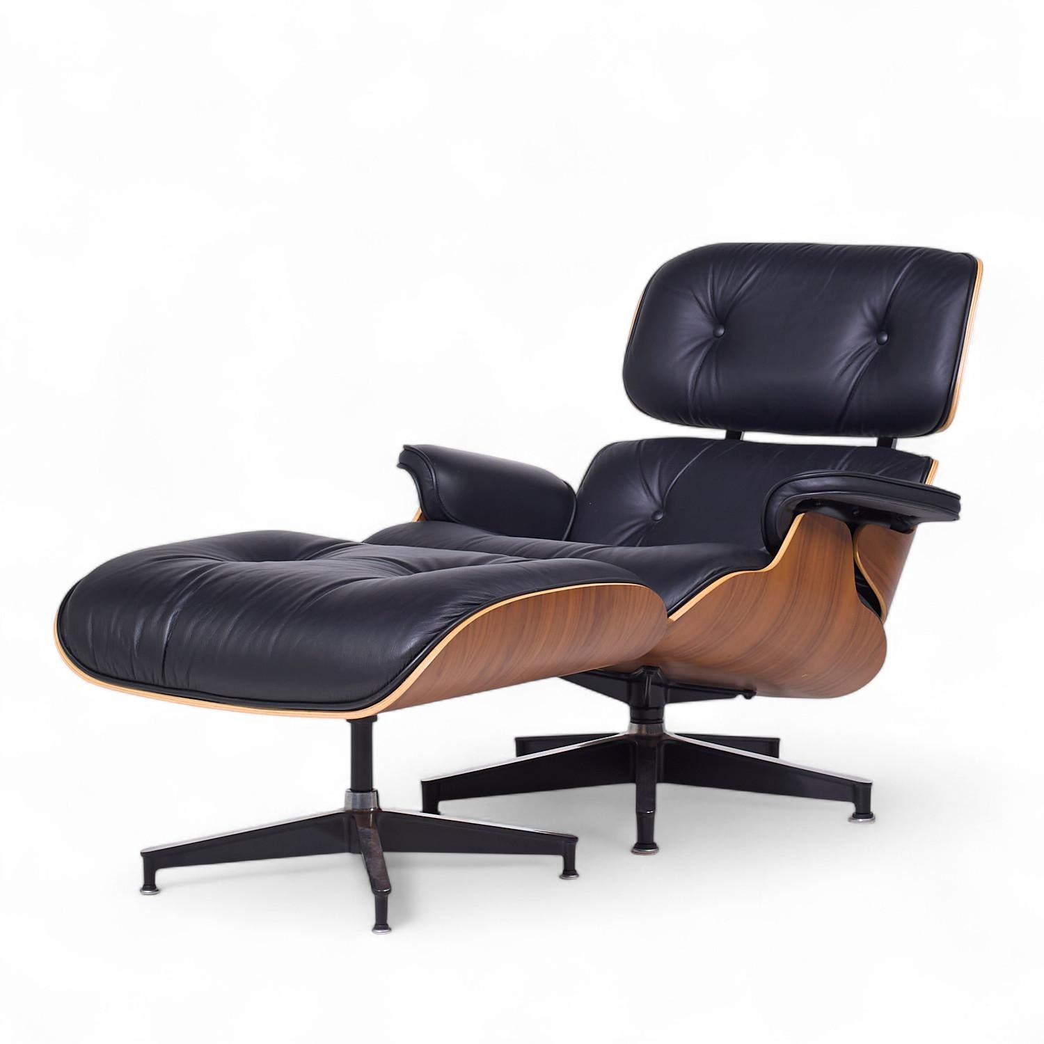 Mid-Century Modern Charles and Ray Eames for Herman Miller Mid Century Walnut Chair and Ottoman For Sale