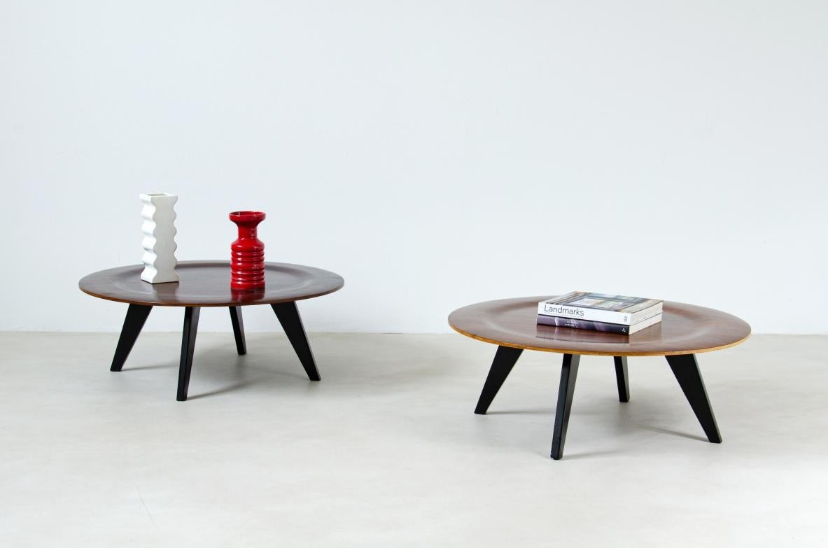 Charles (1907-1978) and Ray Eames (1912-1988).

Pair of coffee tables with rosewood top and ebonized wood legs.
Evans Products/Herman Miller, US, late 1940s.

