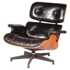 Charles and Ray Eames Rosewood Lounge Chair 670 by Herman Miller