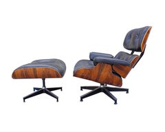 Charles and Ray Eames Rosewood Lounge Chair and Ottoman for Herman Miller (Chaise longue et pouf en bois de rose pour Herman Miller)