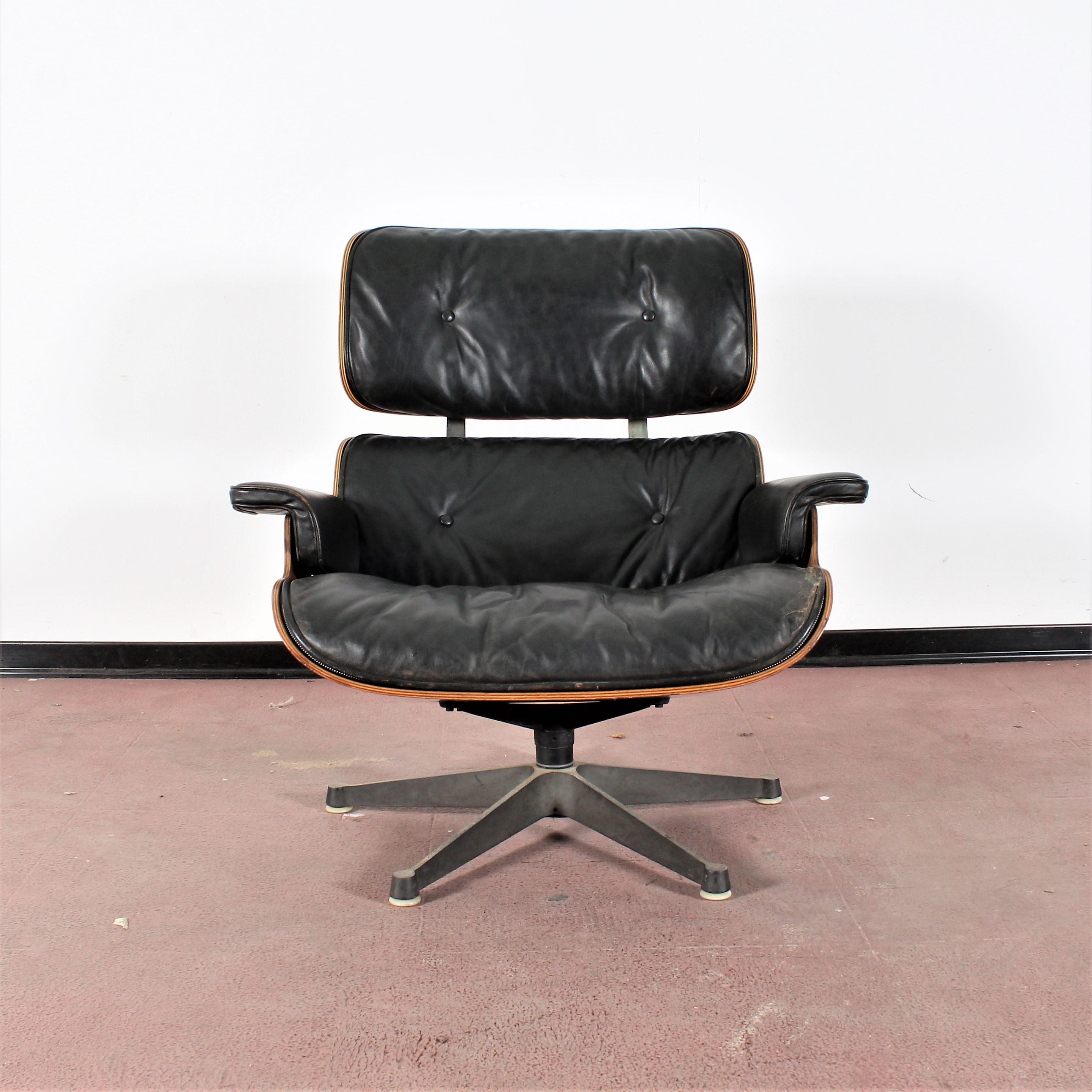 Vintage Eames wood lounge chairs. An iconic pair by Charles and Ray Eames. These are mid-1960s examples. The condition are totally and strictly original.
Frayed leather as in the photo
Wear consistent with age and use.

  