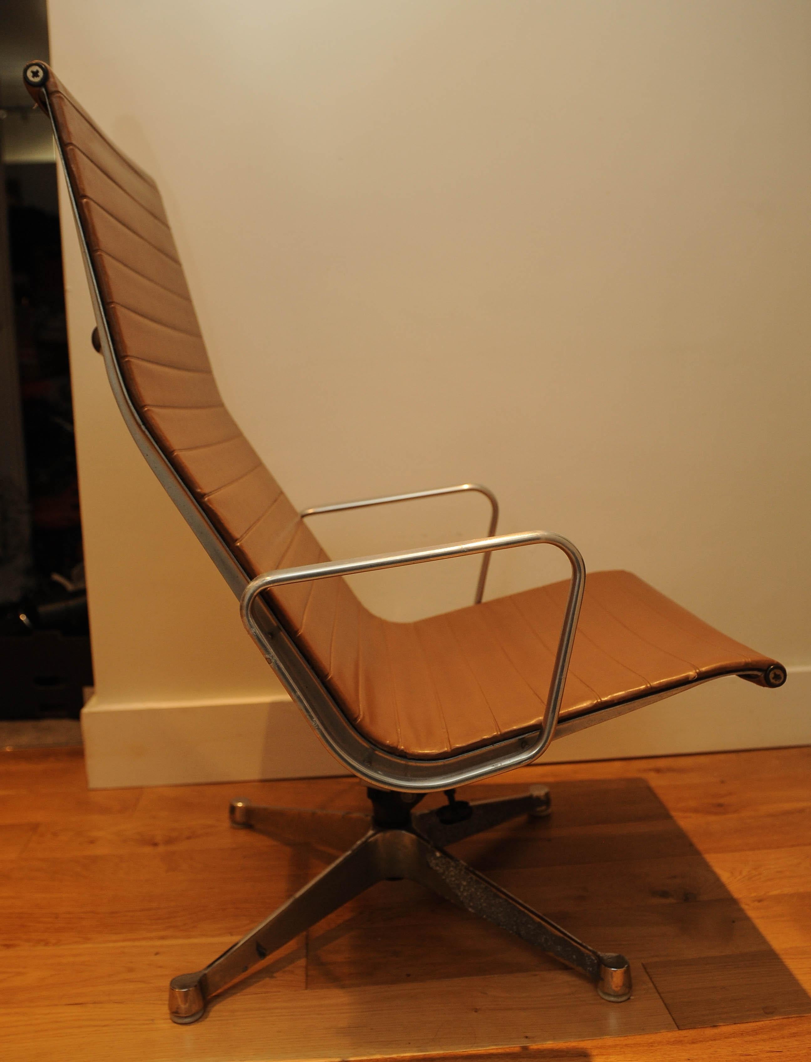 American Charles & Ray Eames 1950's Herman Miller EA124 Swivel Armchair and EA125 Ottoman For Sale