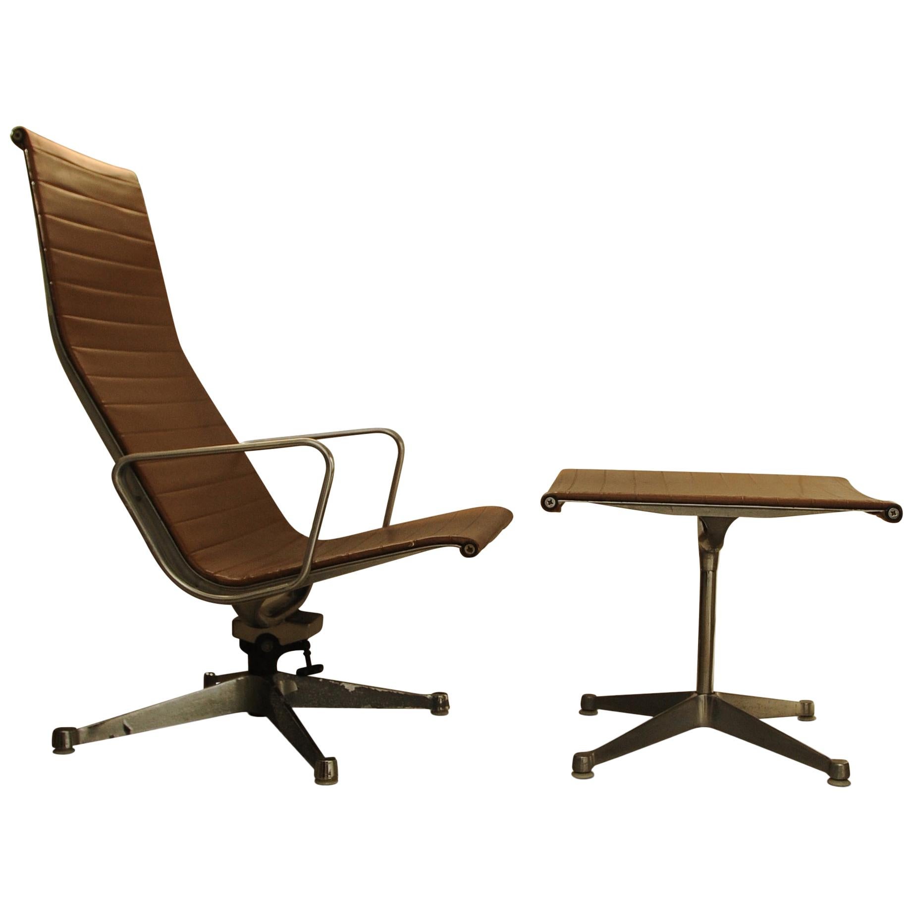 Charles & Ray Eames 1950's Herman Miller EA124 Swivel Armchair and EA125 Ottoman For Sale