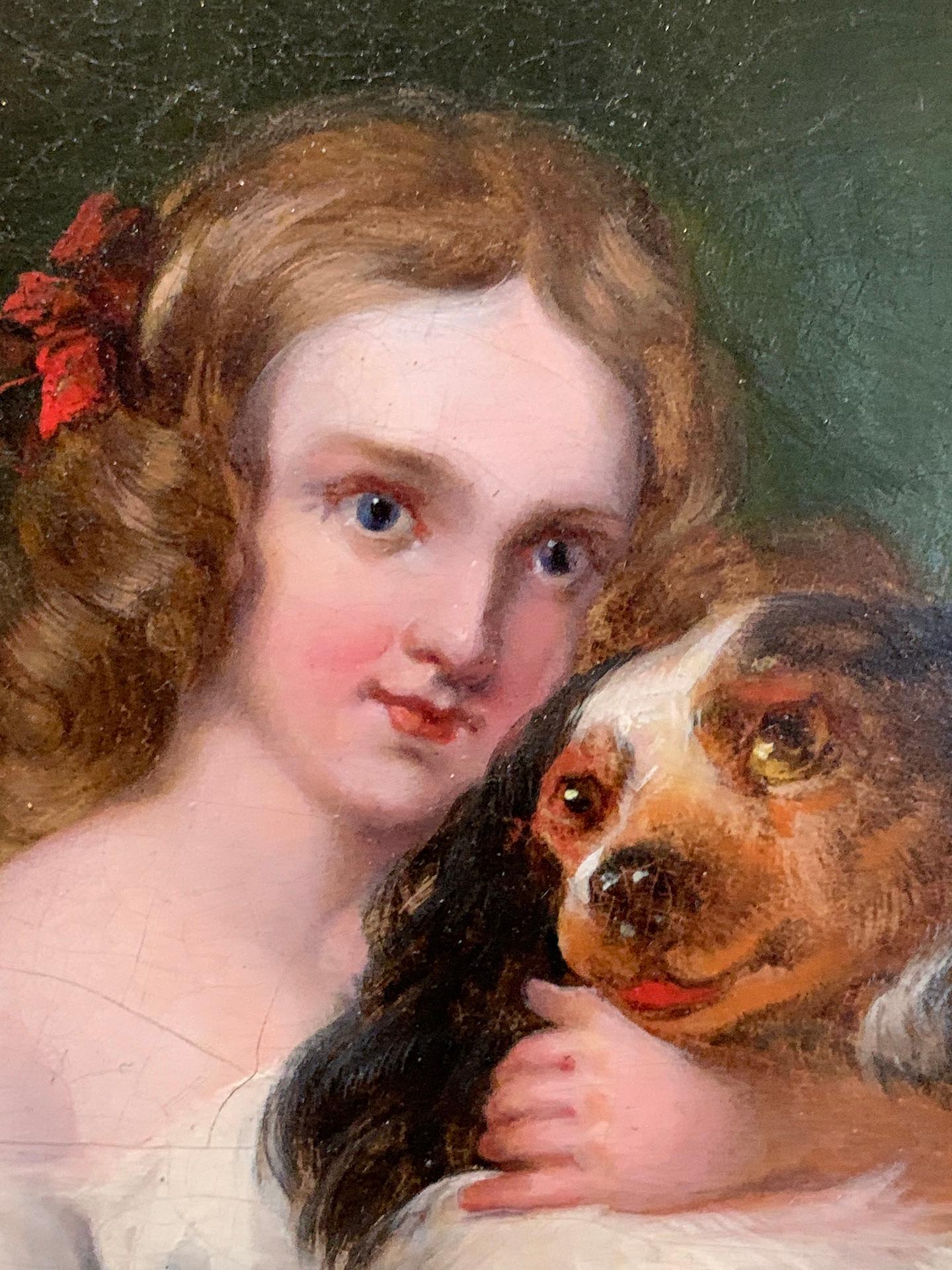 Very pretty19th century portrait of a young girl and her Spaniel. 

The piece is from the middle part of the 19th century when Victorian high-style paintings were at their most sought after.  and this is one such painting

A very well-painted figure