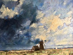 English windmill with stormy sky