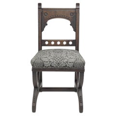 Charles Bevan attributed. A Gothic Revival oak side chair with carved decoration