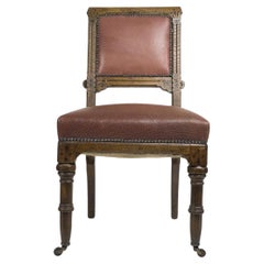 Charles Bevan attributed. A Gothic Revival side chair with scroll carvings