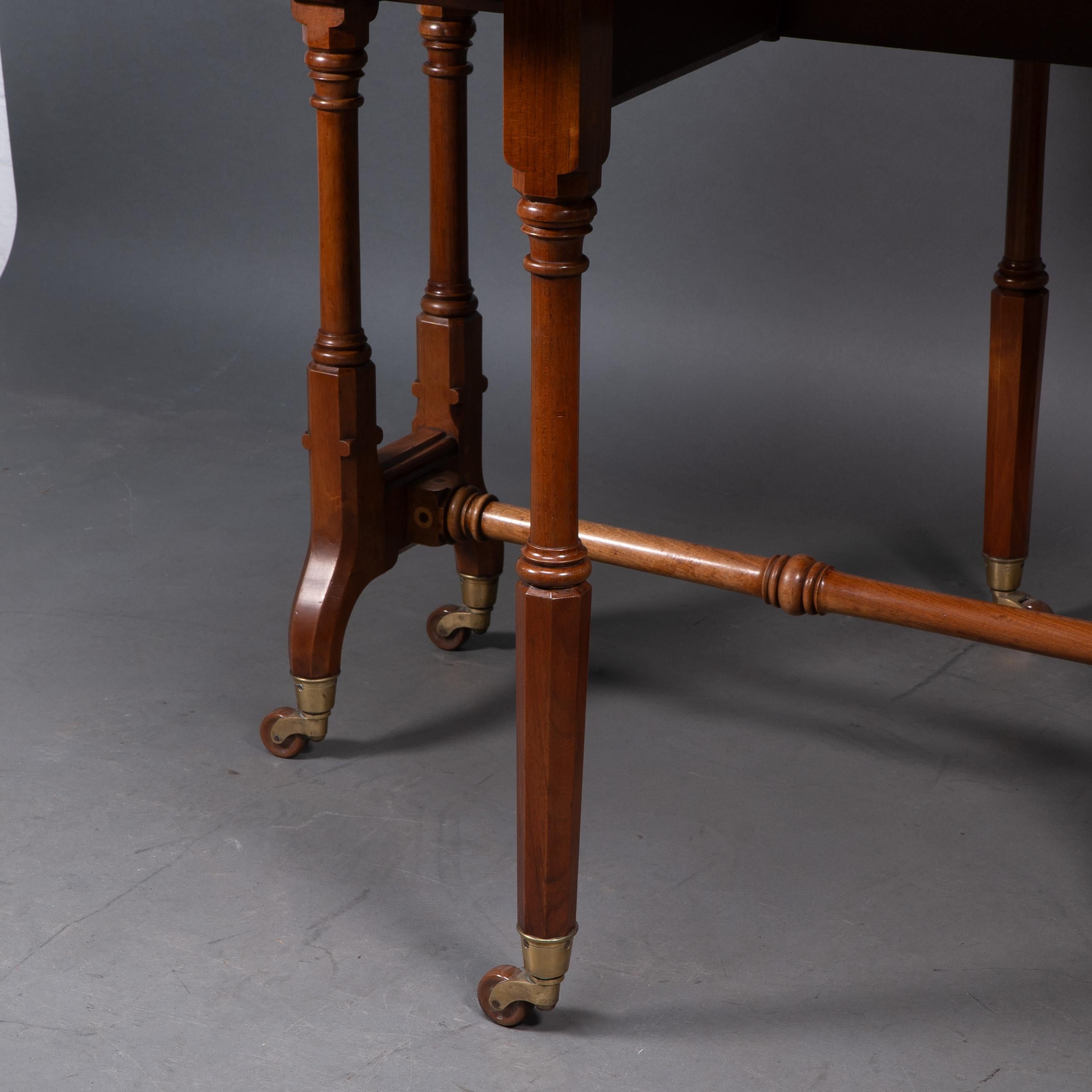 Charles Bevan for Marsh & Jones. A Gothic Revival burr walnut Sutherland table For Sale 12