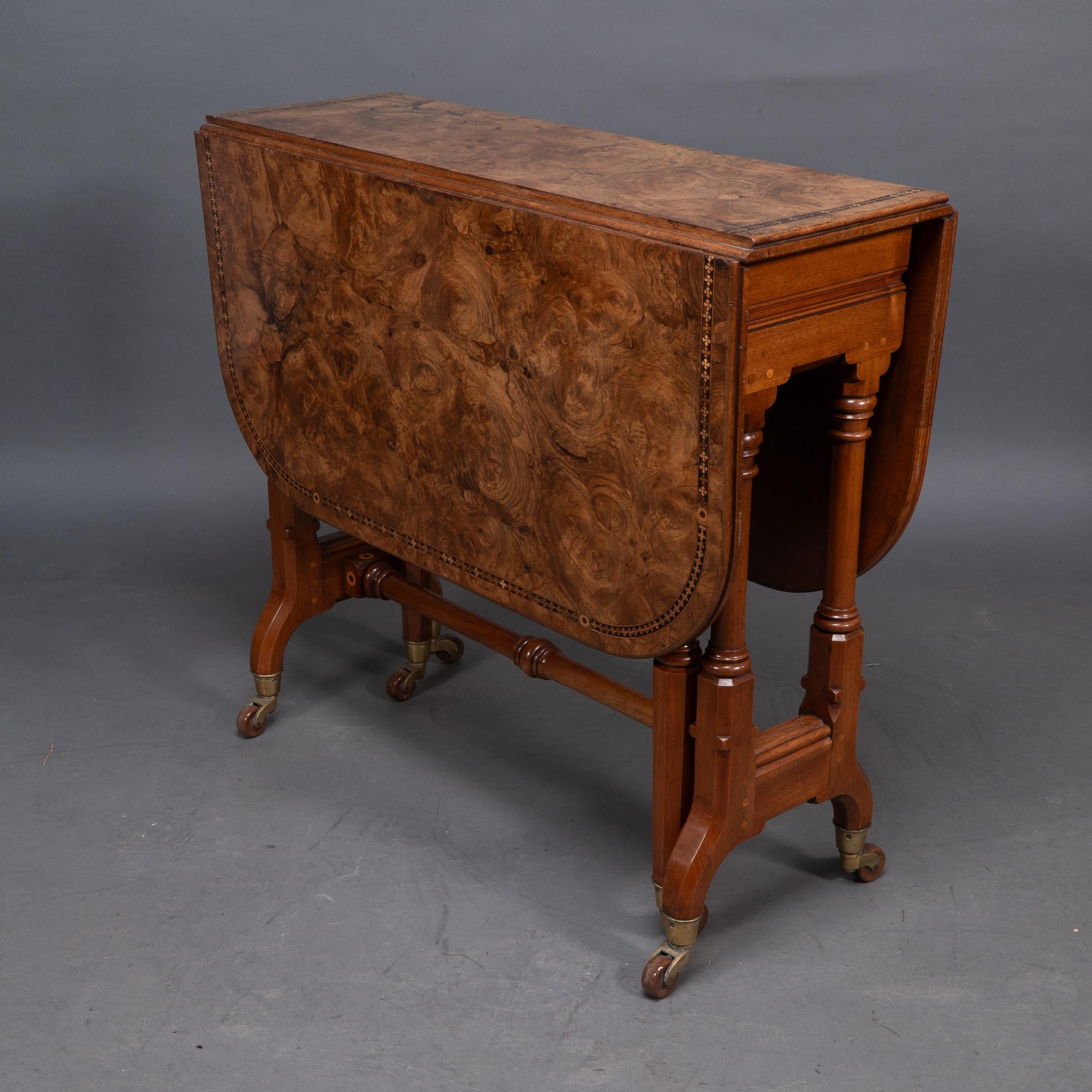 English Charles Bevan for Marsh & Jones. A Gothic Revival burr walnut Sutherland table For Sale