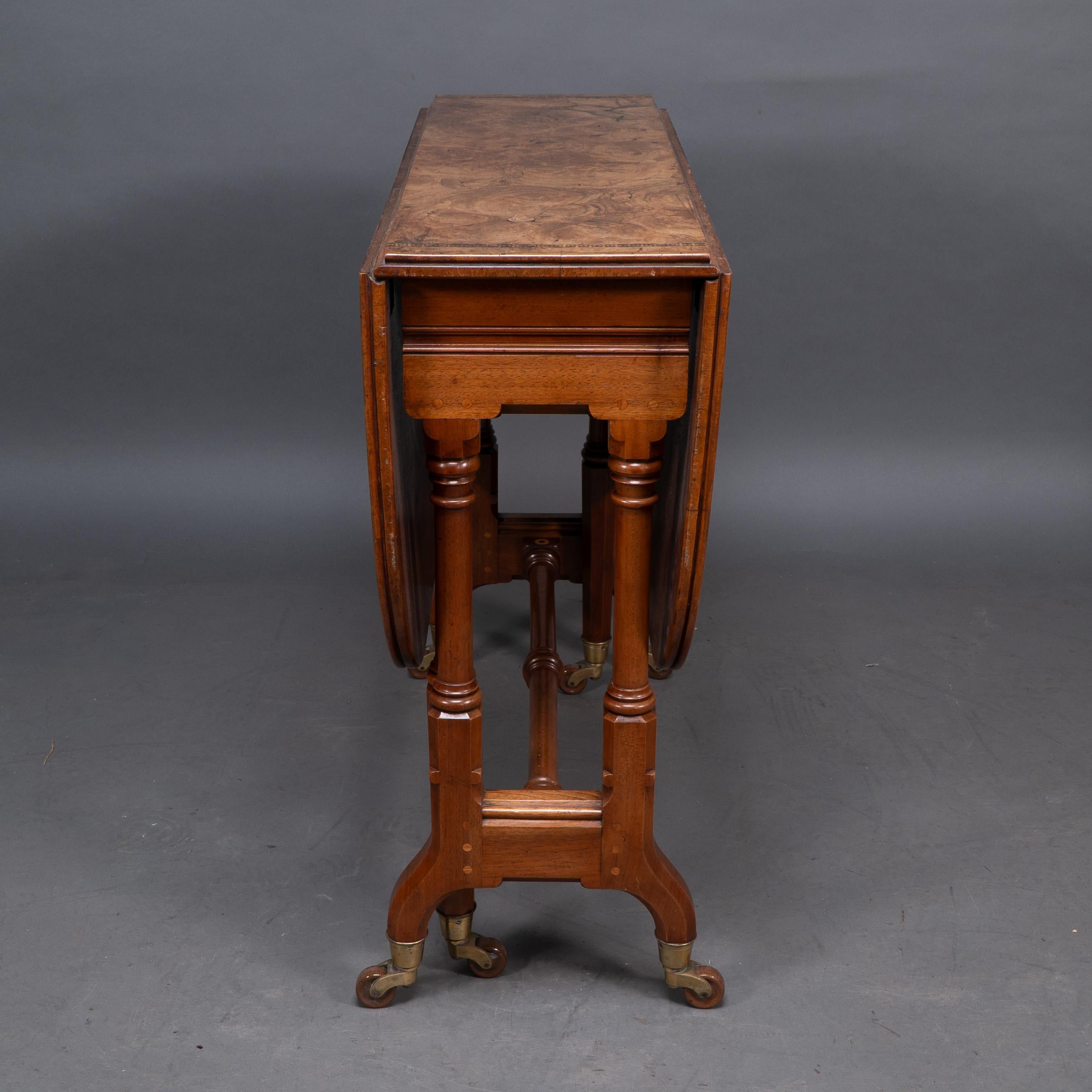 Charles Bevan for Marsh & Jones. A Gothic Revival burr walnut Sutherland table In Good Condition For Sale In London, GB