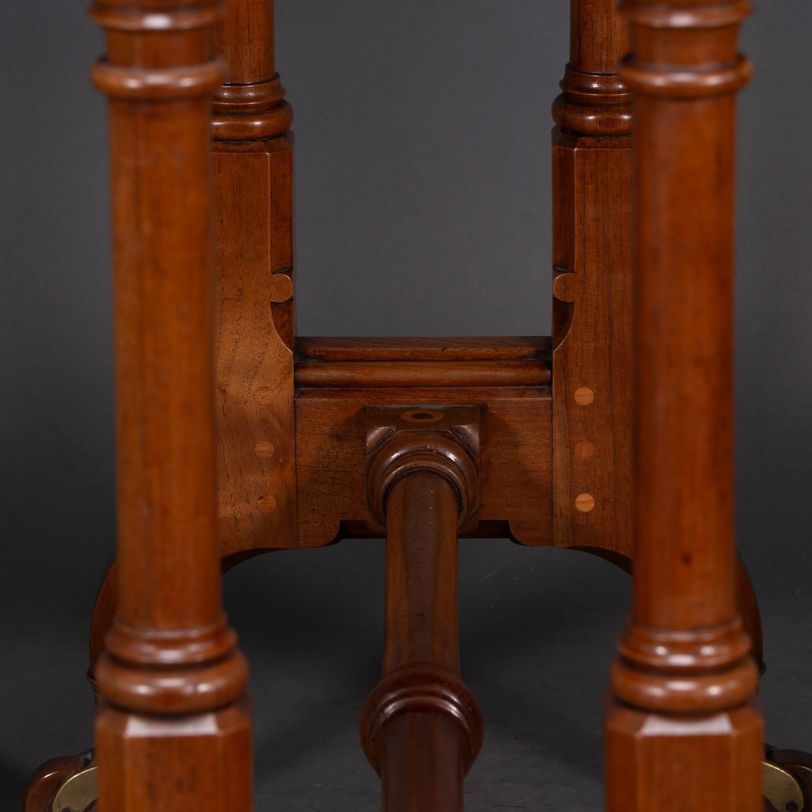 Walnut Charles Bevan for Marsh & Jones. A Gothic Revival burr walnut Sutherland table For Sale