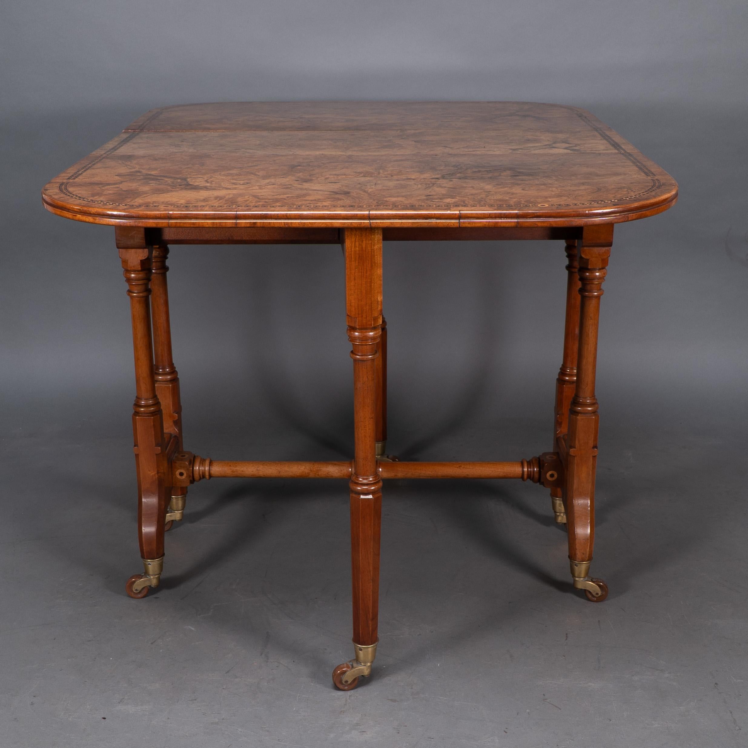 Charles Bevan for Marsh & Jones. A Gothic Revival burr walnut Sutherland table For Sale 3