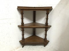 Charles Bevan for Marsh Jones & Cribb. A Gothic Revival Oak Étagère/Corner Piece