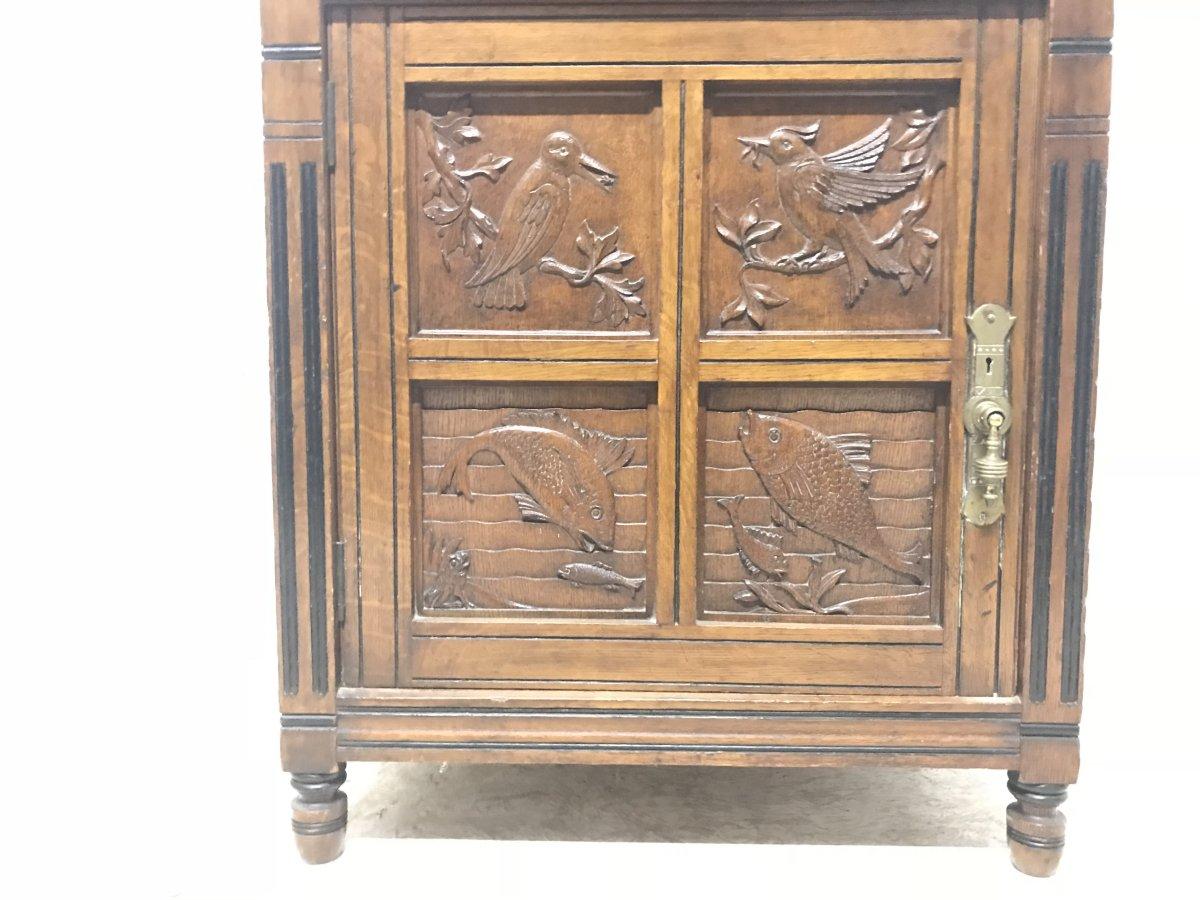 Charles Bevan, Gillows & Co. An Aesthetic Oak Cabinet with Carved Birds & Fish In Good Condition For Sale In London, GB