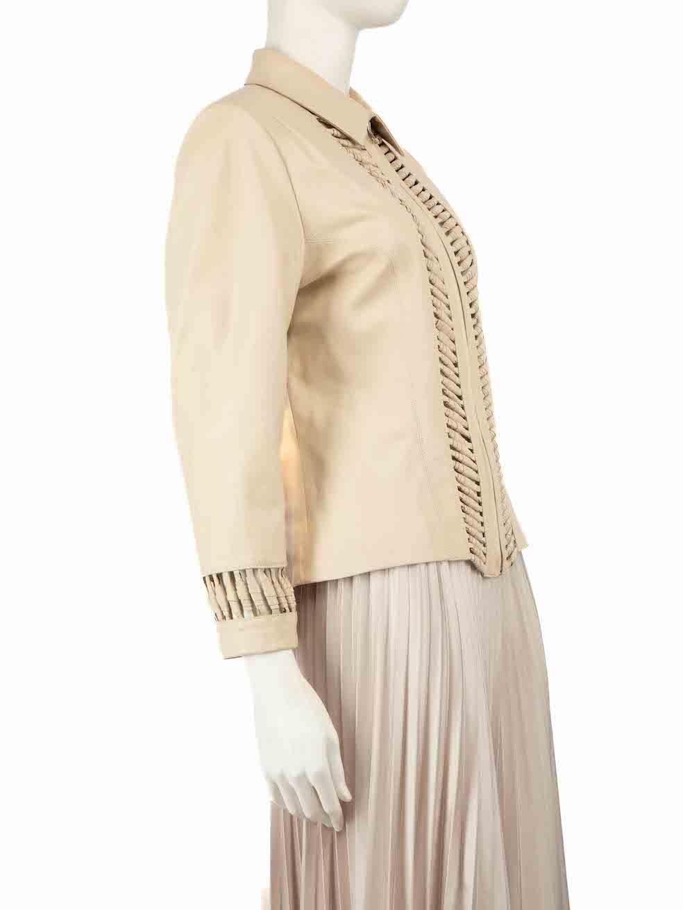 CONDITION is Very good. Minimal wear to jacket is evident. Minimal wear to scratches and abrasion to both cuffs with marks on the left cuff on this used Charles Calfun designer resale item.
 
 
 
 Details
 
 
 Ecru
 
 Leather
 
 Jacket
 
 Cut-out