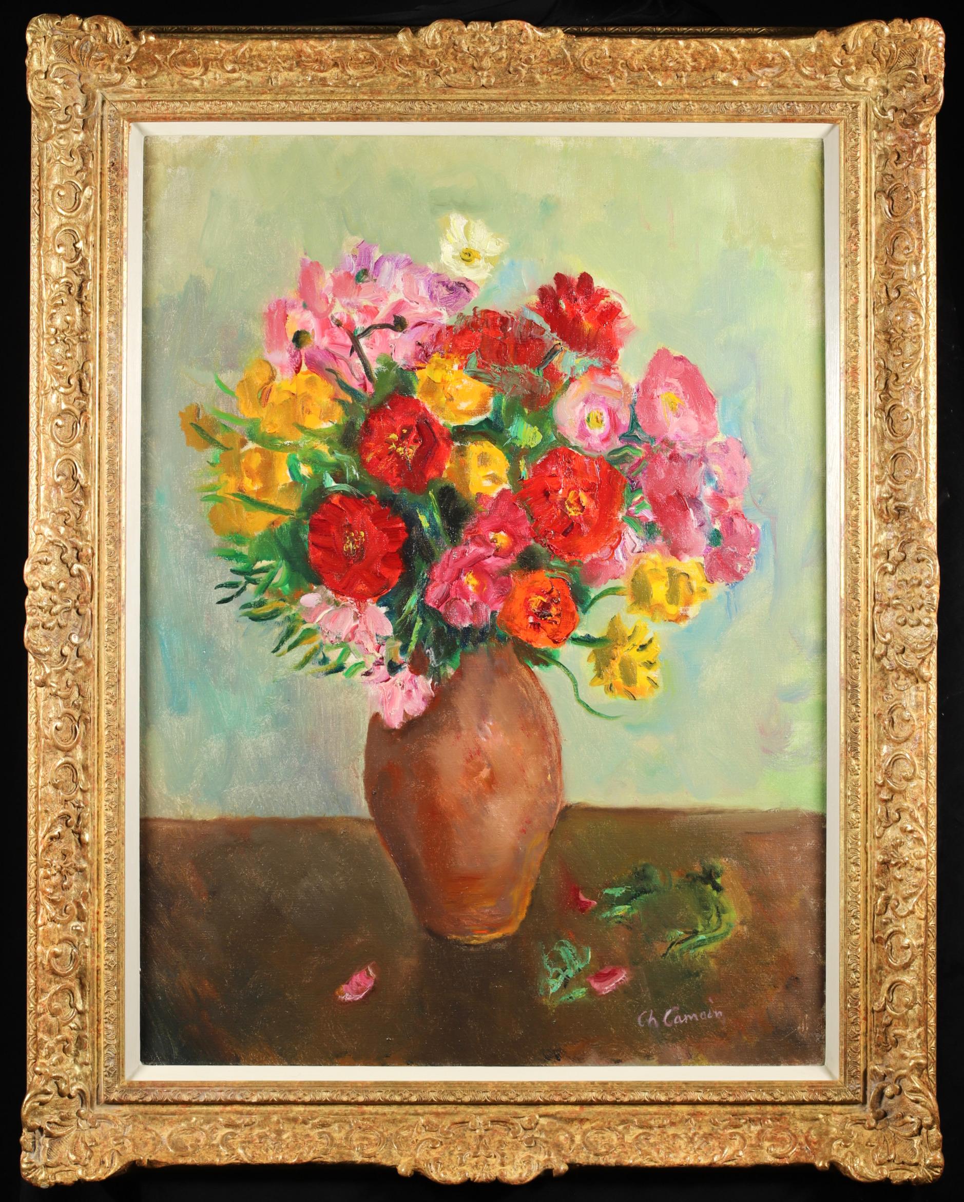 Signiertes Stillleben in Öl auf Leinwand des französischen expressionistischen und fauvistischen Malers Charles Camoin. Das Werk zeigt einen leuchtenden Blumenstrauß in Rot-, Gelb-, Blau- und Rosatönen in einer Vase aus Steingut.