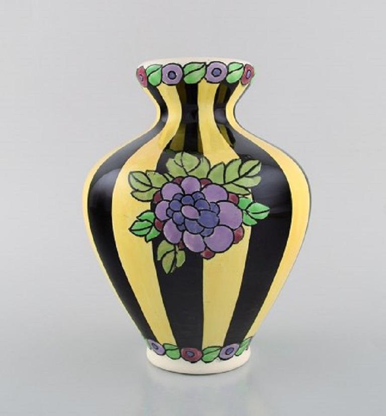 Charles Catteau (1880-1966) for Boch Freres Keramis, Belgium. Art Deco ceramic vase in cloisonné technique. Hand painted with flowers, 1920s-1930s.
Measures: 20.5 x 15.5 cm.
In very good condition.
Stamped.