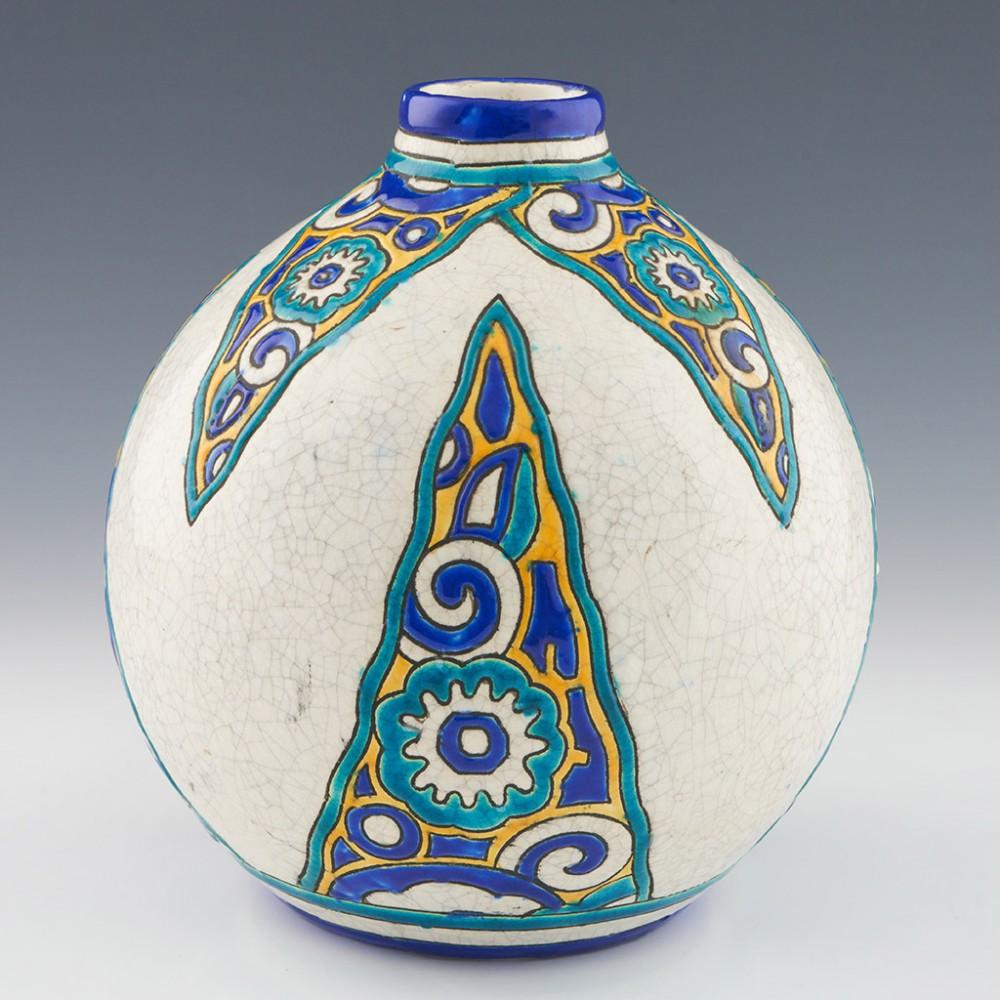 Charles Catteau for Boch Freres Art Deco Vase, circa 1925

Additional information:
Date: c.1925
Origin: Belgium 
Bowl Features: Art Deco abstract polychrome floral design over a white ground 
Marks: Boch Freres printed mark along with pattern