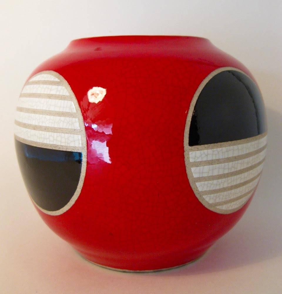 Late 20th century red and white raku studio pottery orb vase by North Carolina artist Charles Chrisco. Signed 