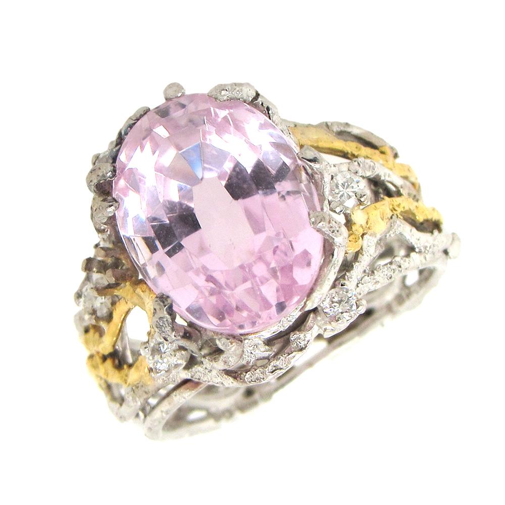 Rare ring by British designer Charles de Temple, circa 1970's, set with an oval pink kunzite, approx. 5 cts tw, in his signature style handmade textured 18K yellow and white gold branch-like mounting.