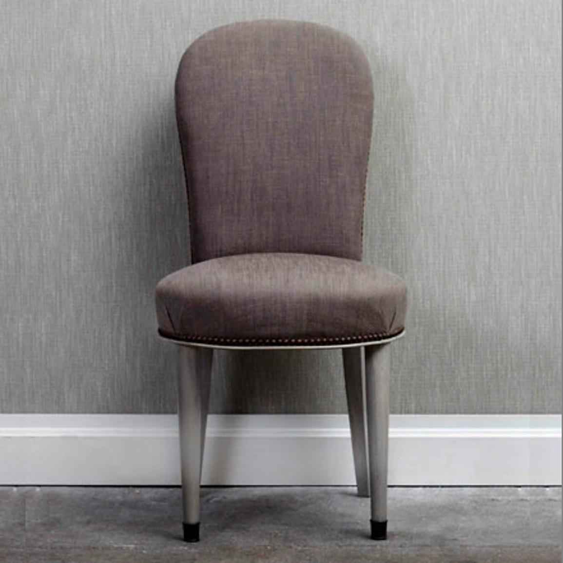 Armless dining chair with rabbet detailing and nailhead trim. The Charles Chair frame is constructed using solid maple wood. Four finishes available for chair legs. Available in four Cotton fabric options or can be upholstered using customer's own