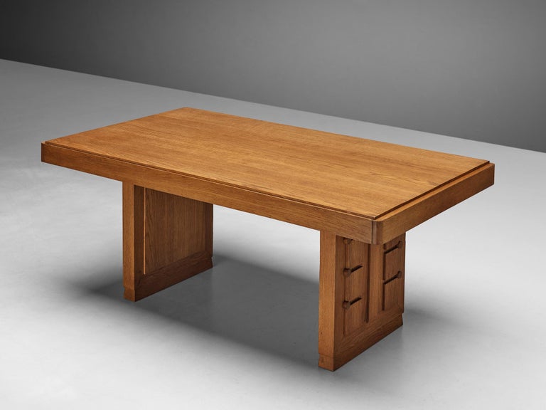 Charles Dudouyt, dining table, oak, Europe, 1940s 

Art Deco style dining table with a natural character due to the striking tabletop with inlays designed by Charles Dudouyt (1885-1946). It shows perfect craftsmanship, as can be seen on the two