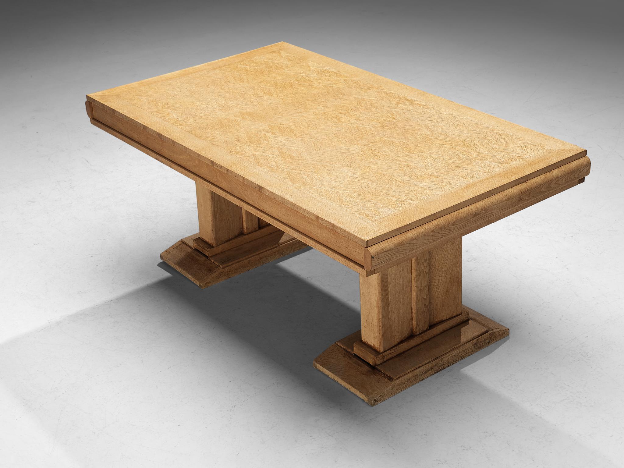 Charles Dudouyt, dining table, oak, 1940s, France. 

Created by the French designer Charles Dudouyt, this well-designed dining table is architectural in its structure and alludes to the stylistics traits of the artistic Art Deco movement of the