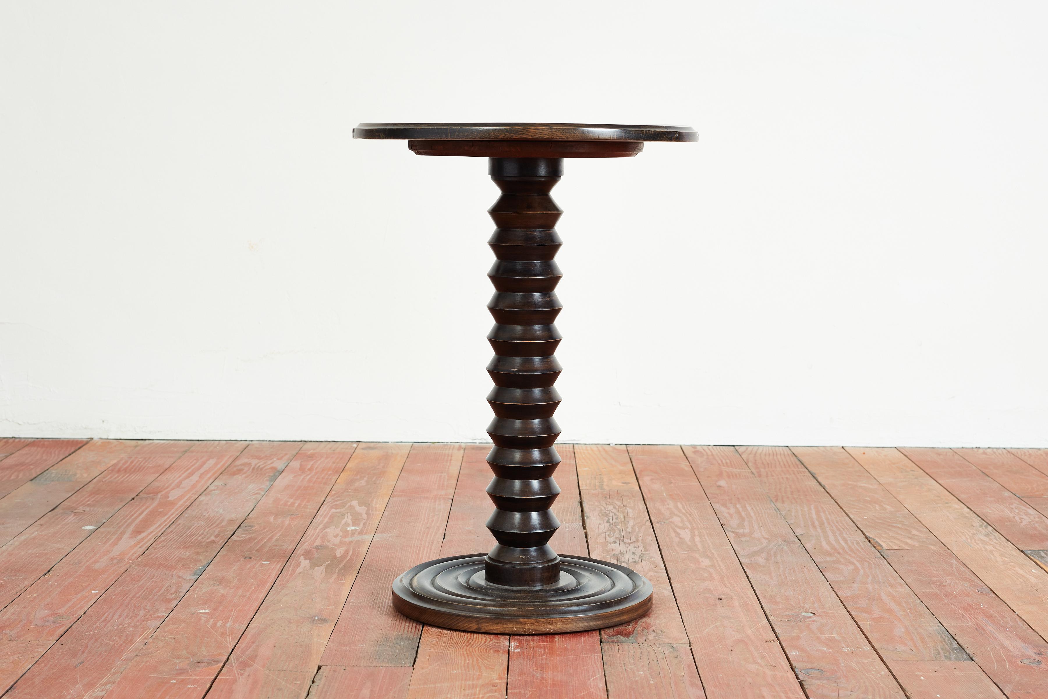 Charles Dudouyt attributed side table in ebony 
Rich dark patina to oak
Signature corkscrew base