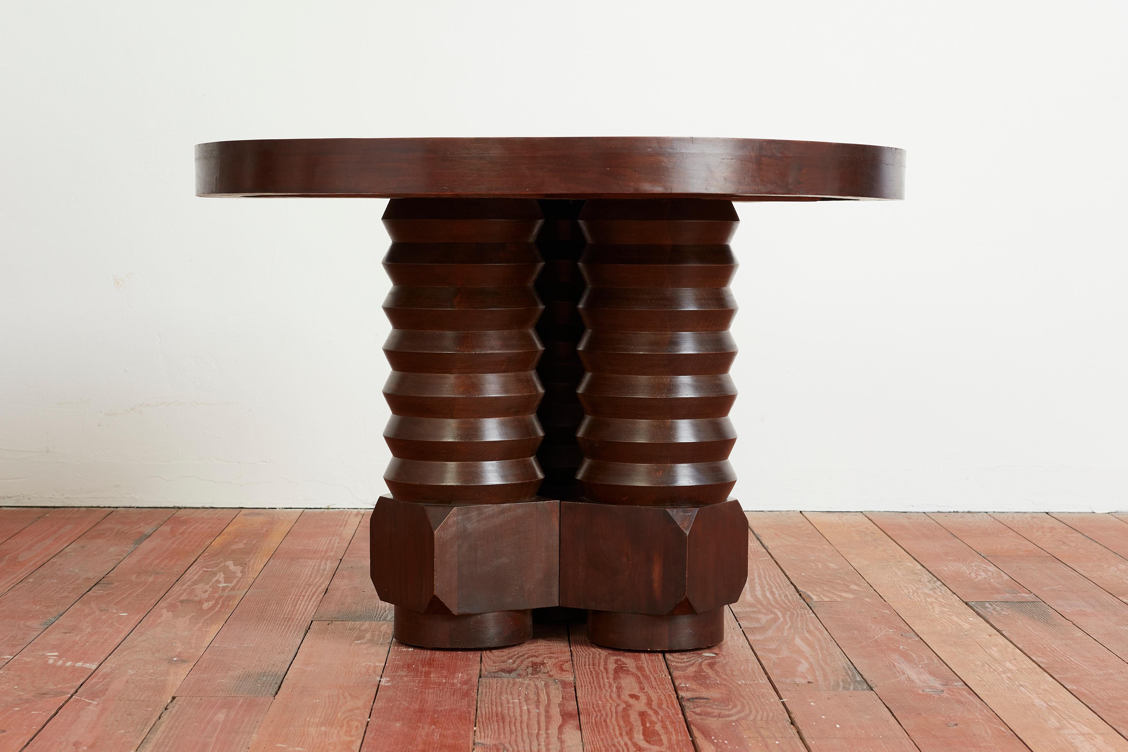 Incredible center table by Charles Dudouyt with three thick corkscrew carved center legs and circular table top. 
France circa 1940s
Wonderful rich patin to wood. 
Rare and extraordinary piece.