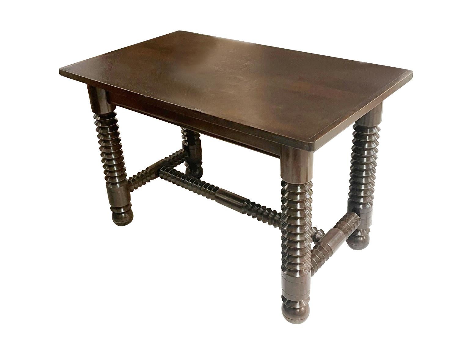 1940's French Charles Dudouyt console.
Can also be used as a desk.
Signature spool leg and stretcher design. 
Ball shaped legs.
Recently restored and refinished.