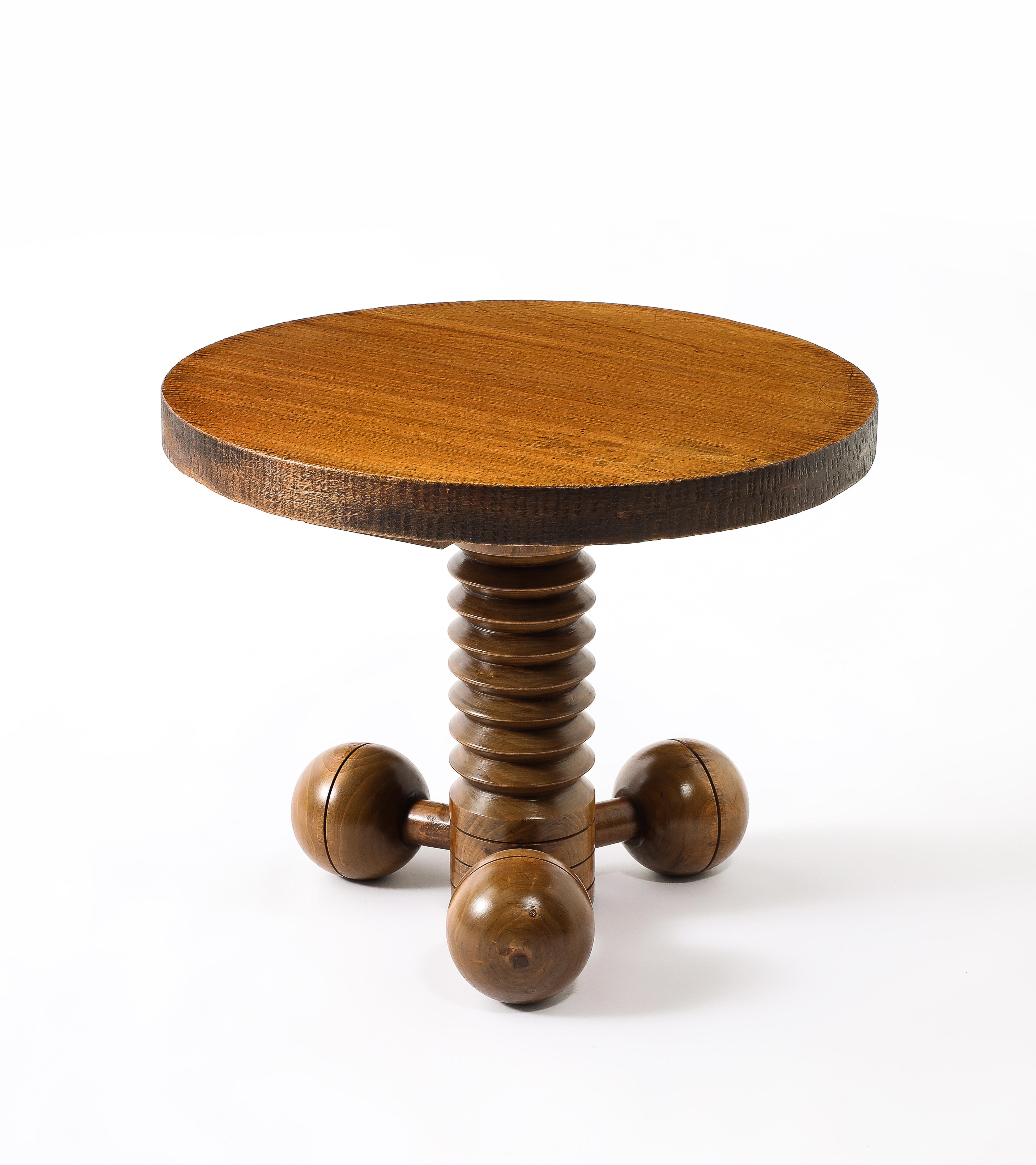 Classic side table by Charles Douduy in an unusual lighter
finish.
