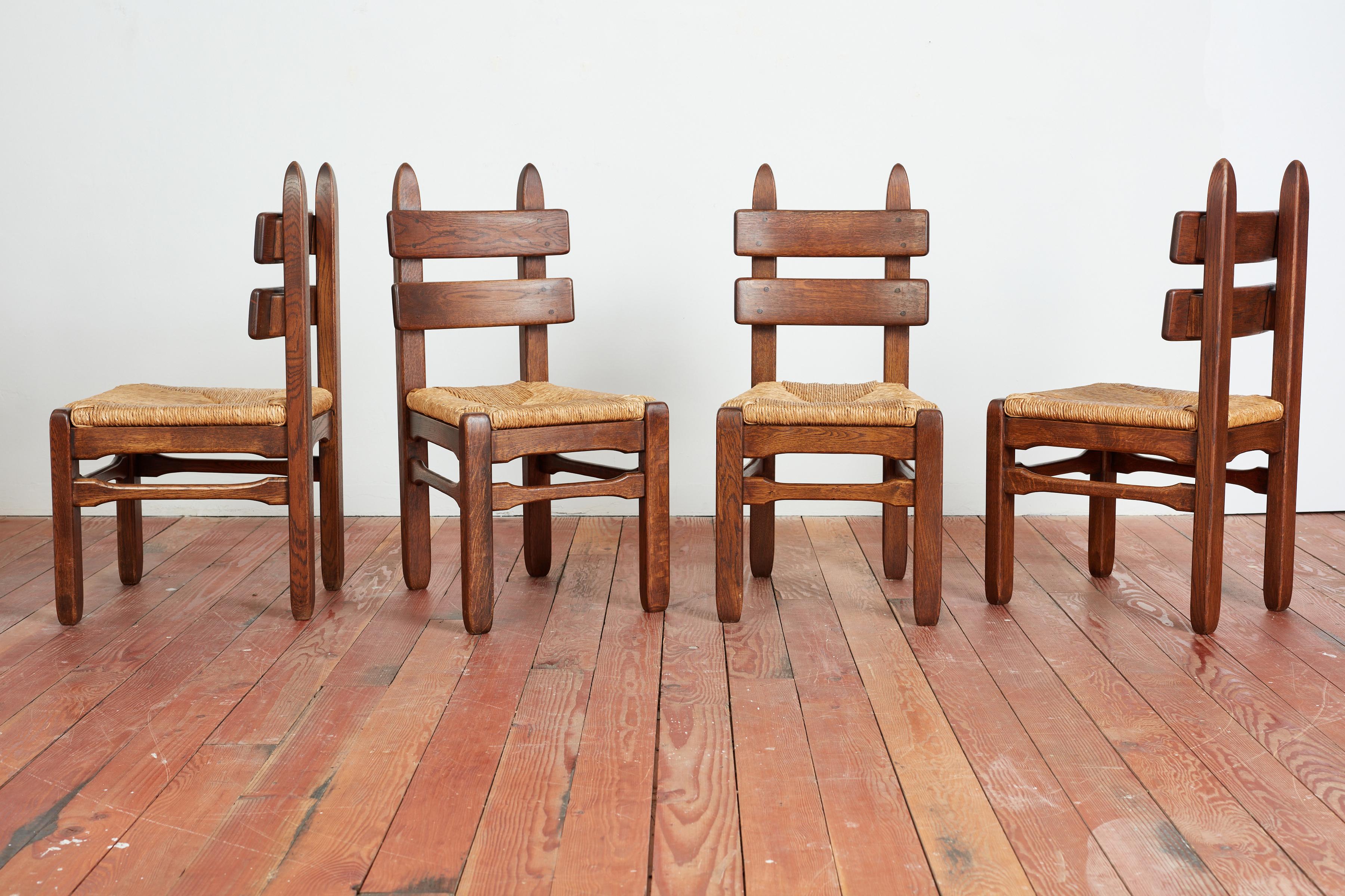Set of 6 dining chairs by Charles Dudouyt
France, 1940s 
Wonderful sculptural ladder backs with 
