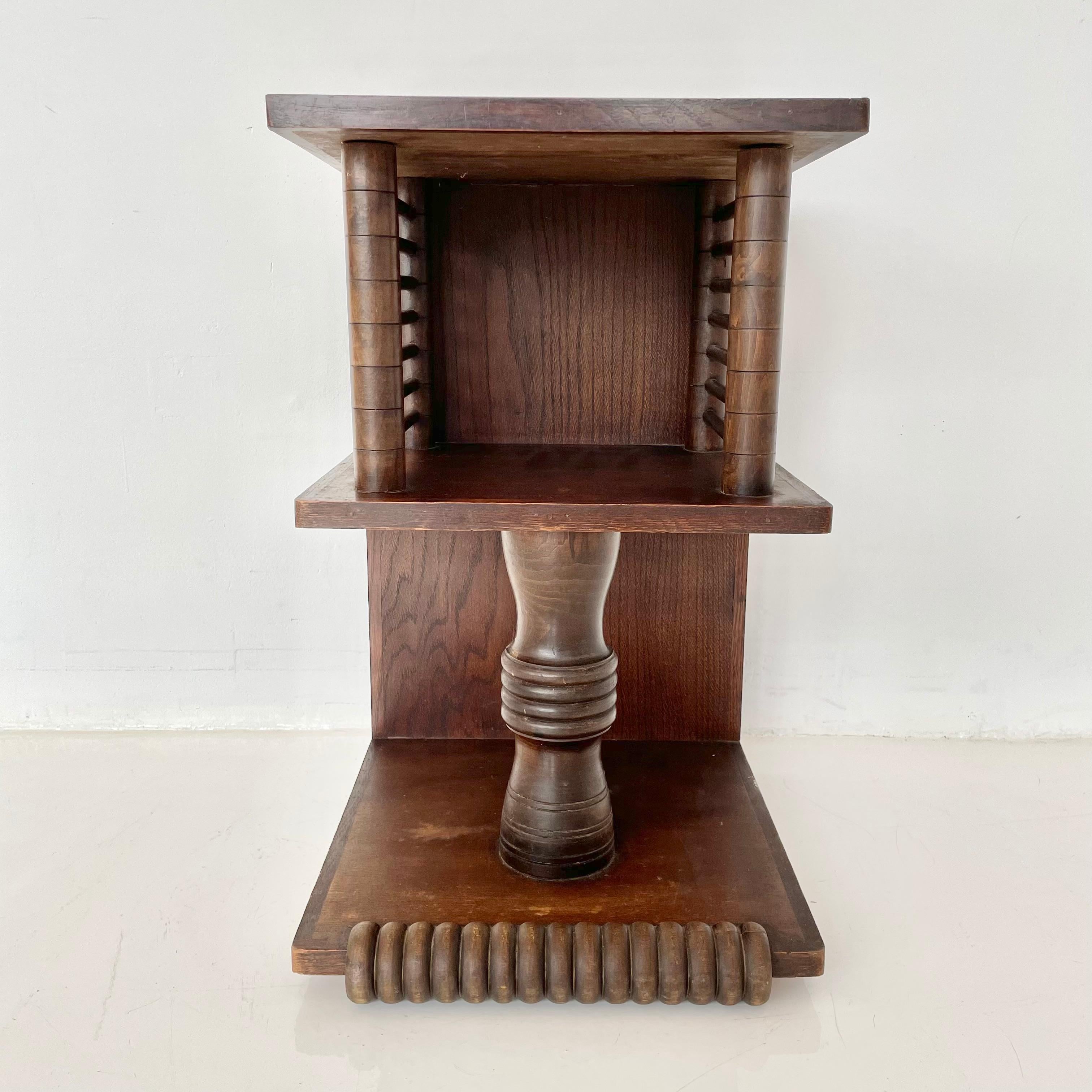 Charles Dudouyt (1885-1946) French end table, circa 1930.
Influenced heavily by African art, these richly carved tables mark an aesthetic exodus form Art Deco to the bold abstract forms of Picasso and the modern movement.

A prominent figure in