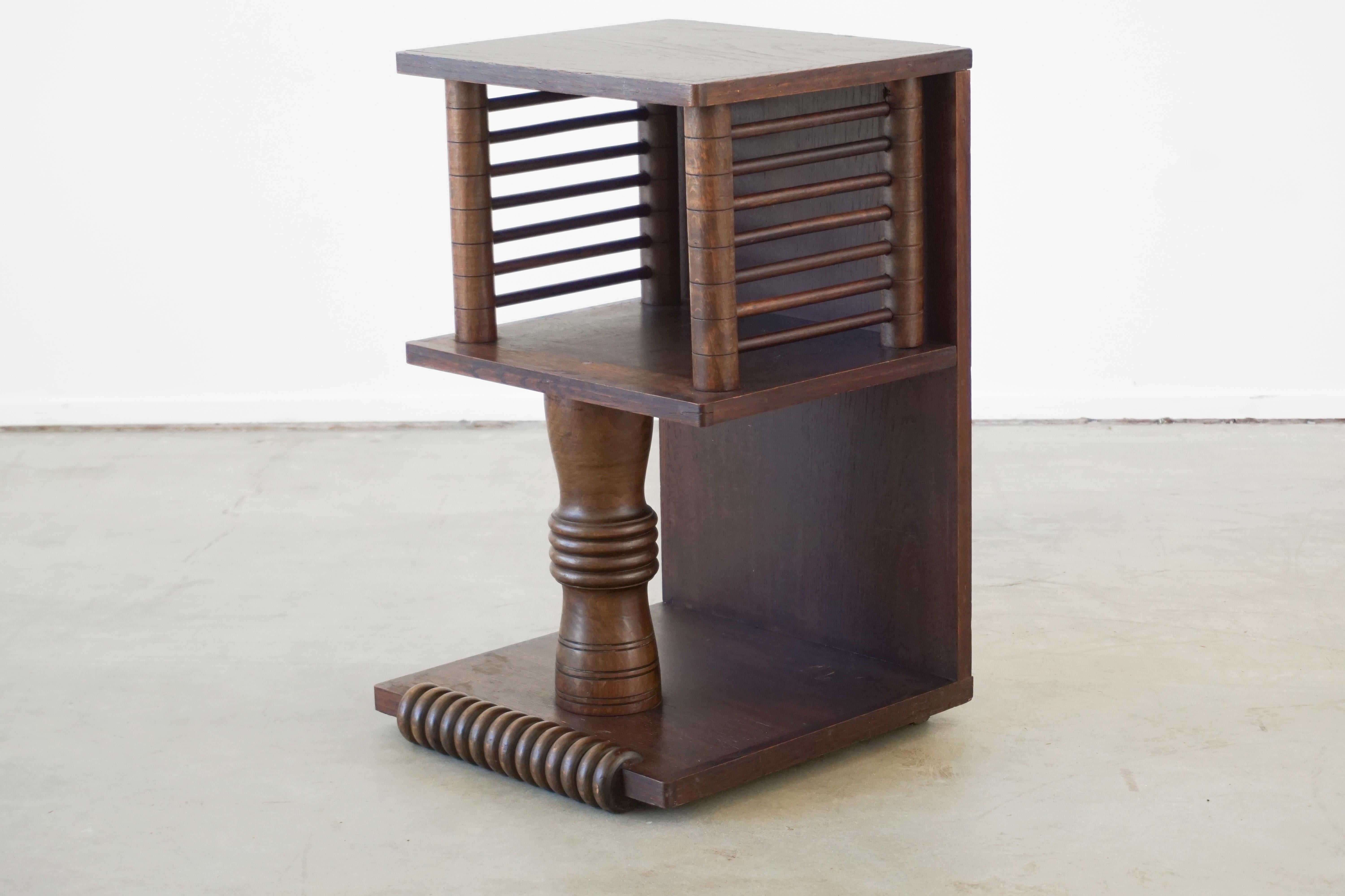 Single end table by Charles Dudouyt with ornate carved pedestal base 
Gorgeous wood patina.