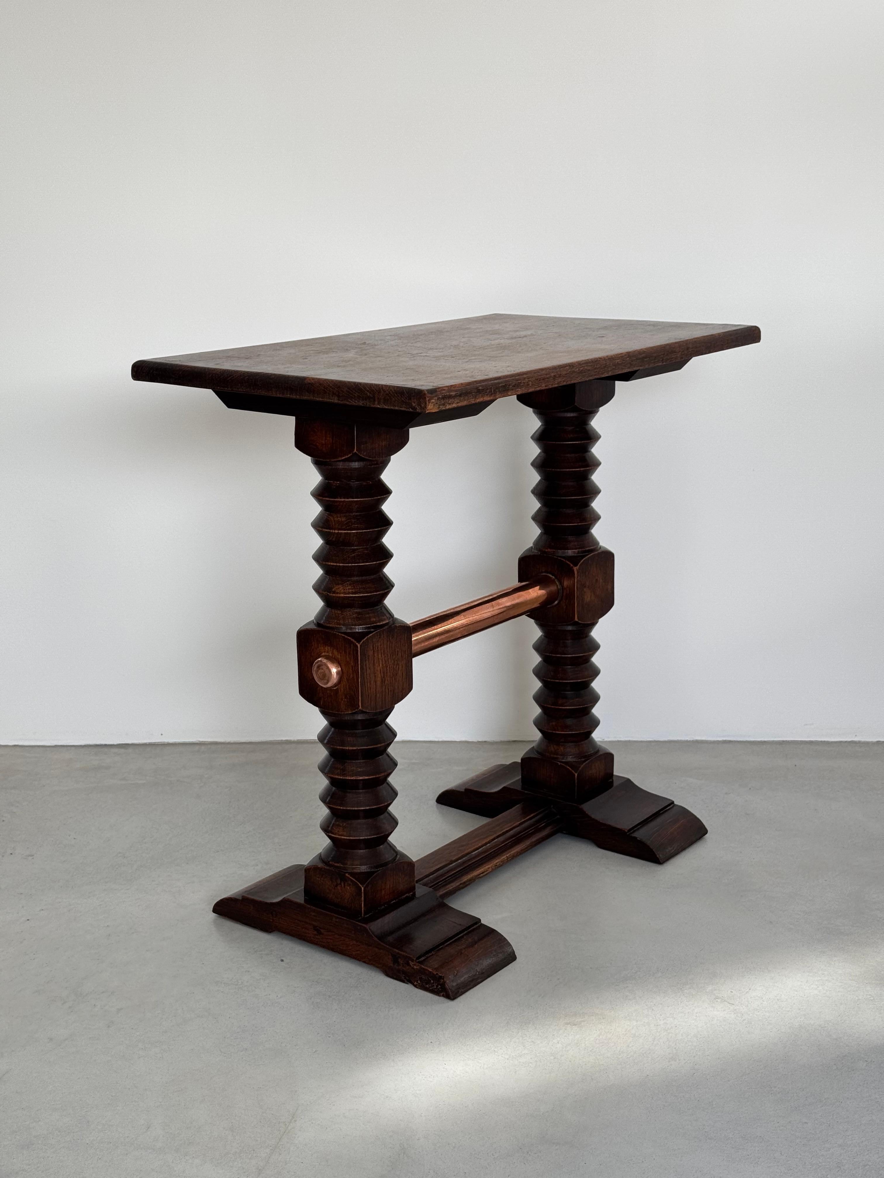 Rustic Charles Dudouyt exceptional solid oak side table & copper crosspiece, circa 1940 For Sale