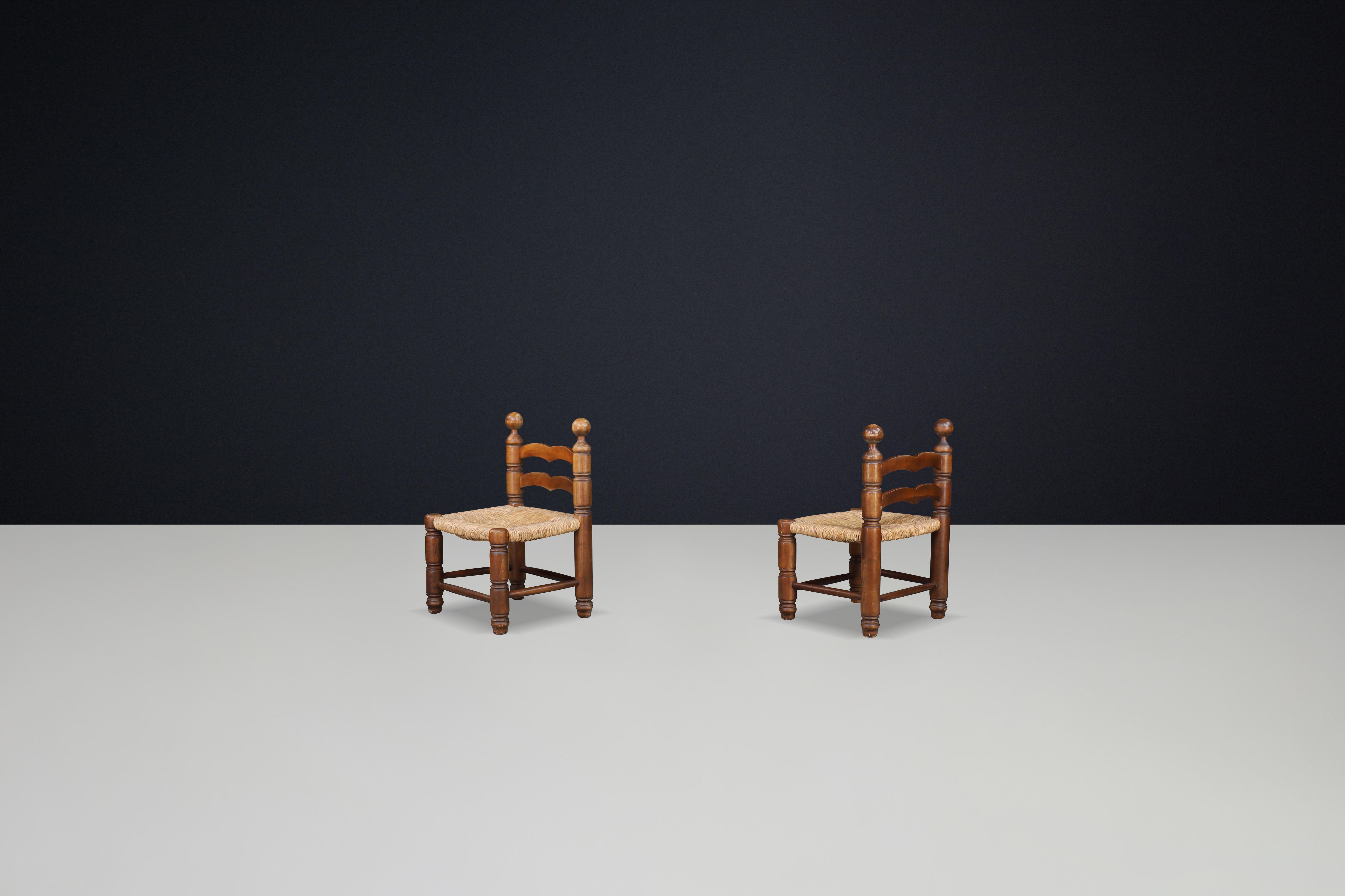 Brutalist Charles Dudouyt fireplace chairs made from beech wood and Rush seats France 1940 For Sale