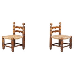 Charles Dudouyt fireplace chairs made from beech wood and Rush seats France 1940