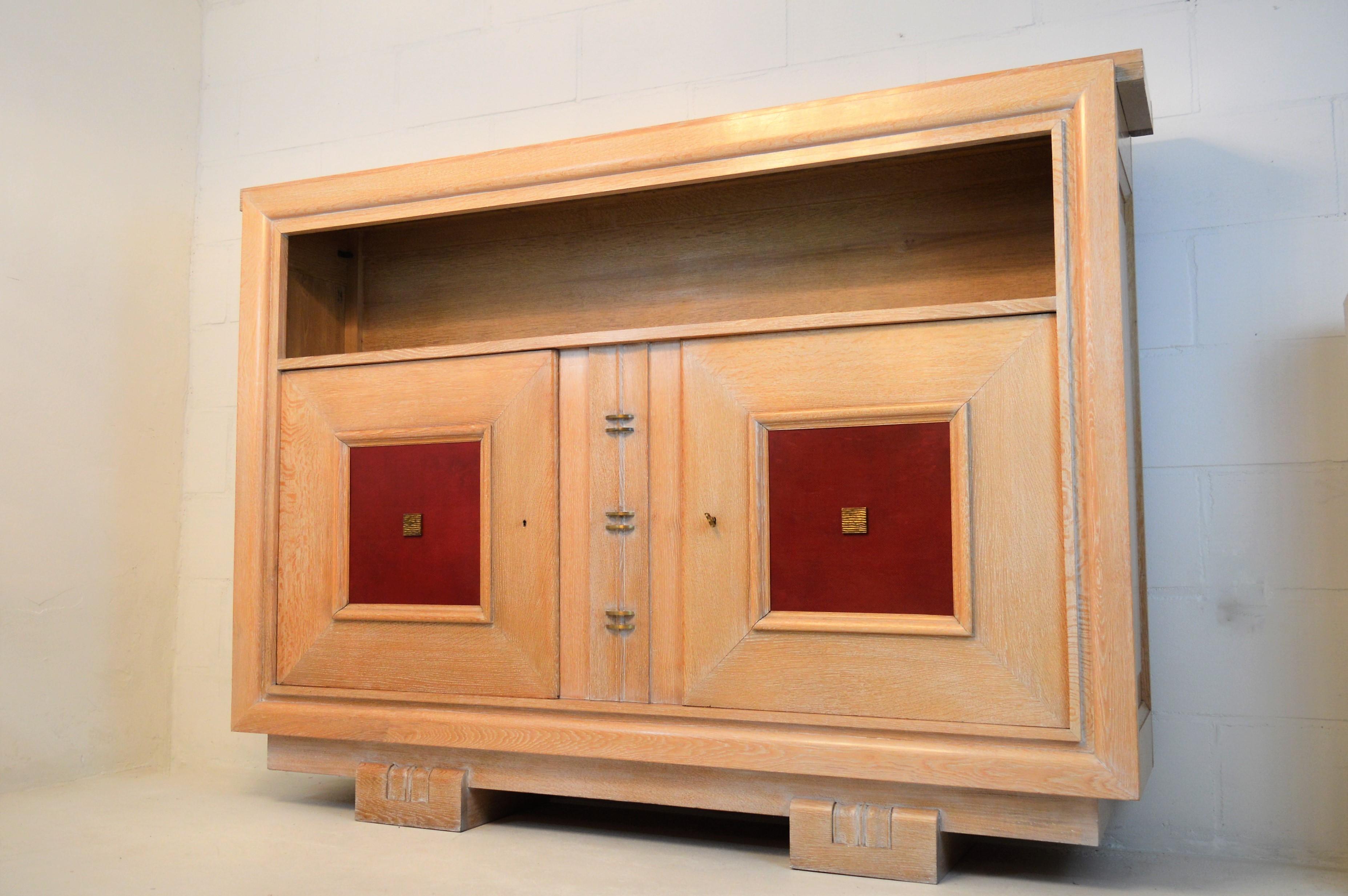 Art Deco Charles Dudouyt Masterpiece Oak Cabinet, with Doorpanels Covered in Red Leather
