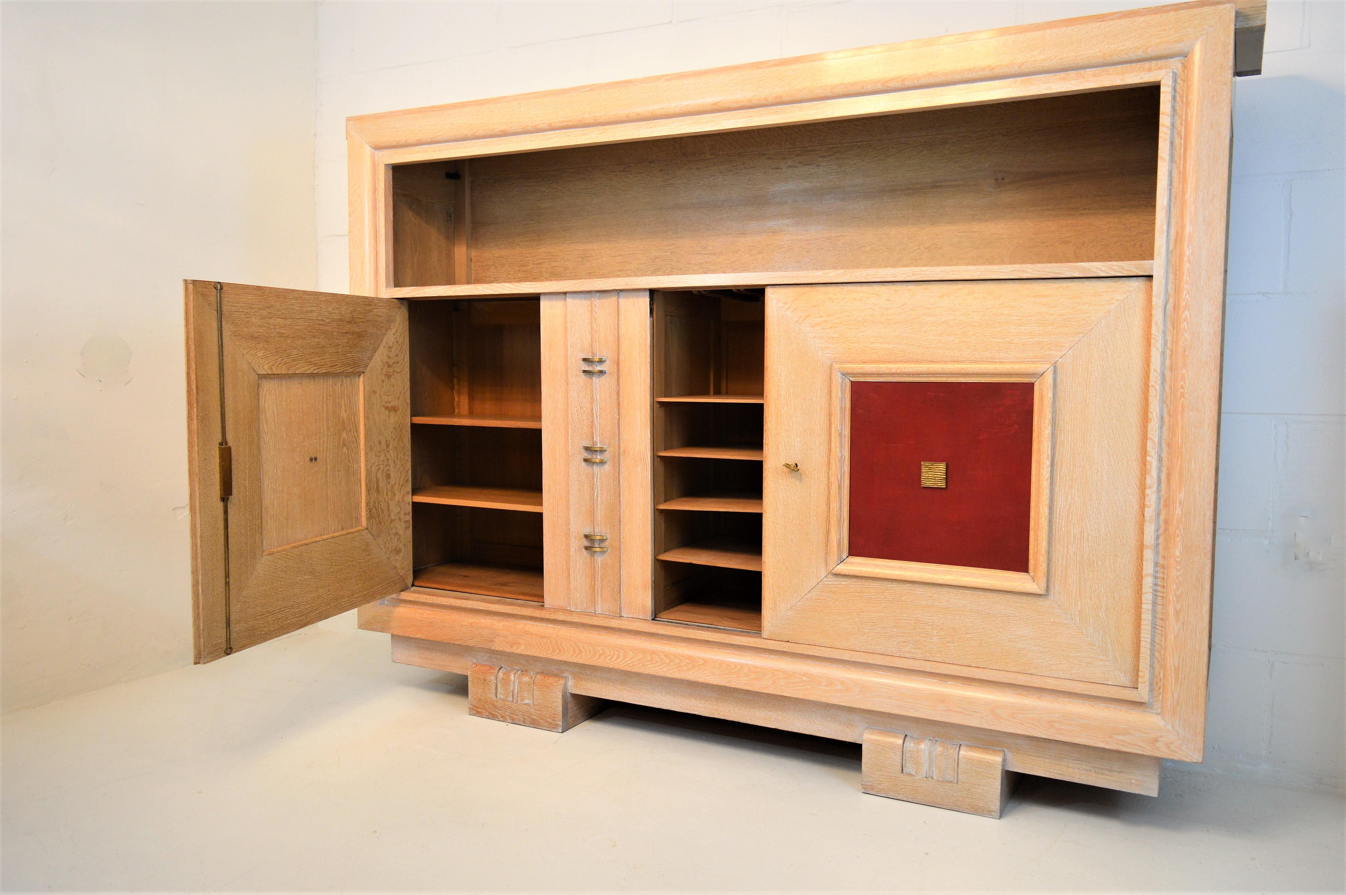 Bronze Charles Dudouyt Masterpiece Oak Cabinet, with Doorpanels Covered in Red Leather