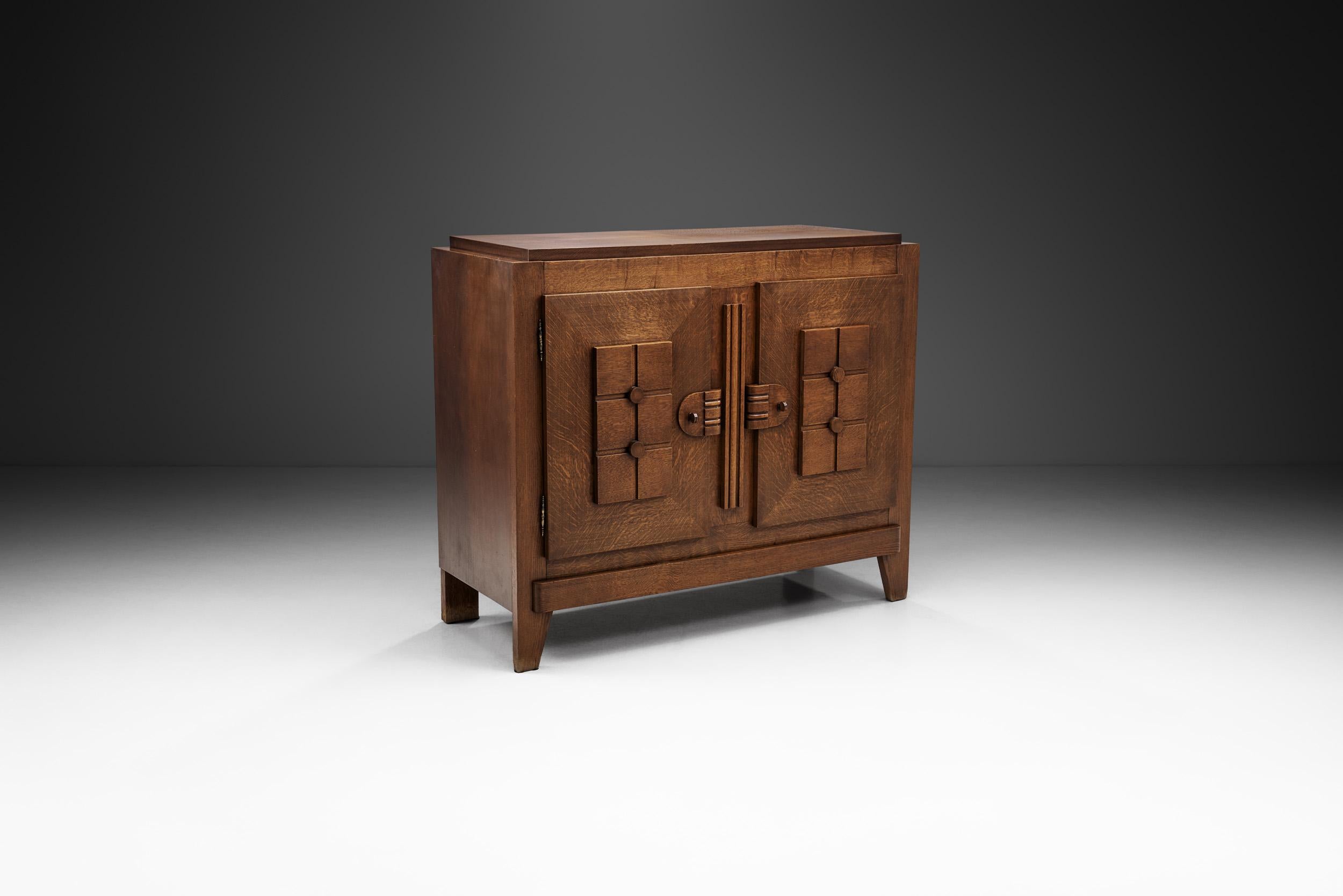 Featuring French designer, Charles Dudouyt’s signature style, this sideboard melds seamlessly with any style thanks to its elegant sense of lavishness. The oak form is elemental, enhanced by the sculptural carvings.

With its graphic carvings on