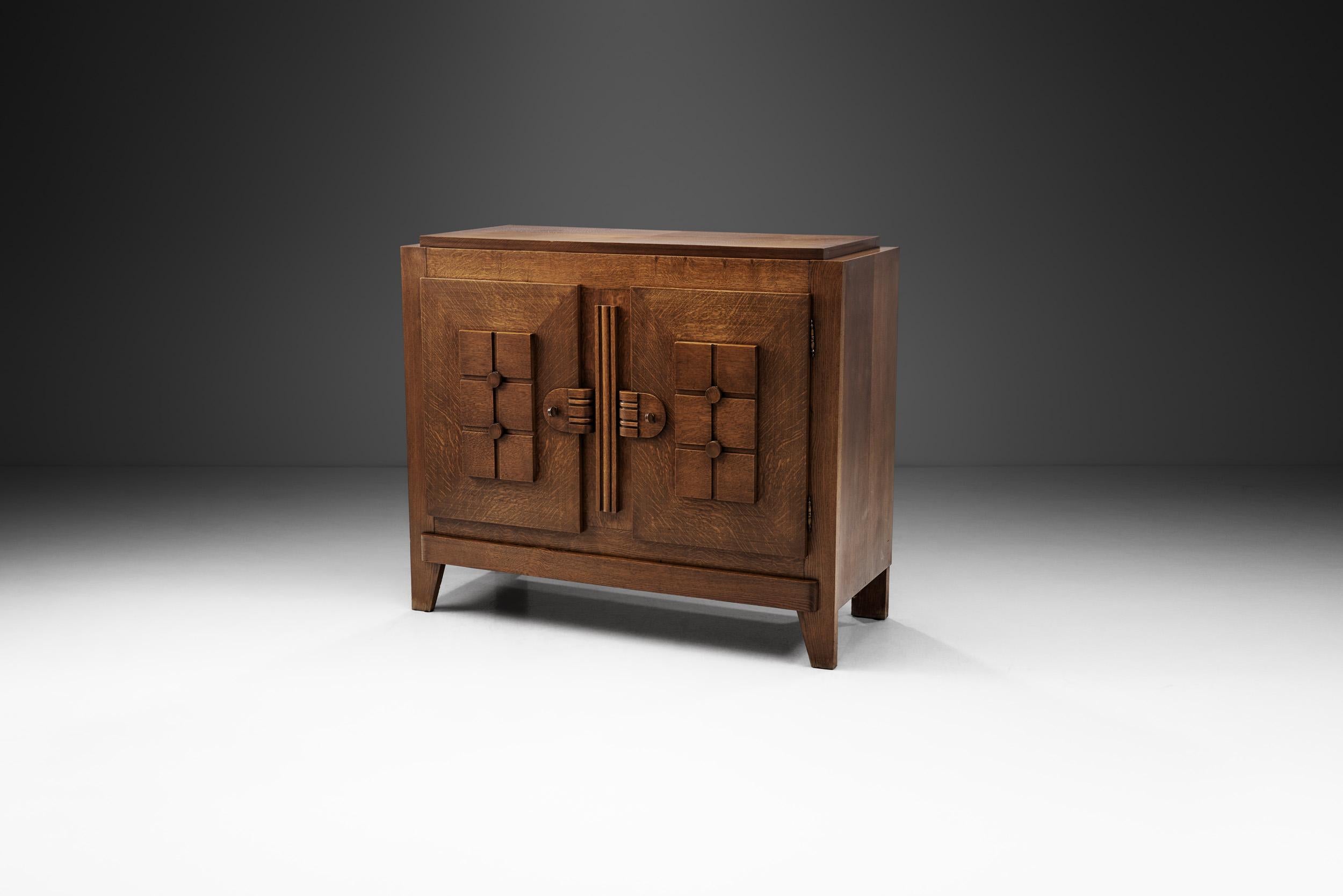 Mid-20th Century Charles Dudouyt Oak Carved Sideboard with Brass Keys, France, 1940s