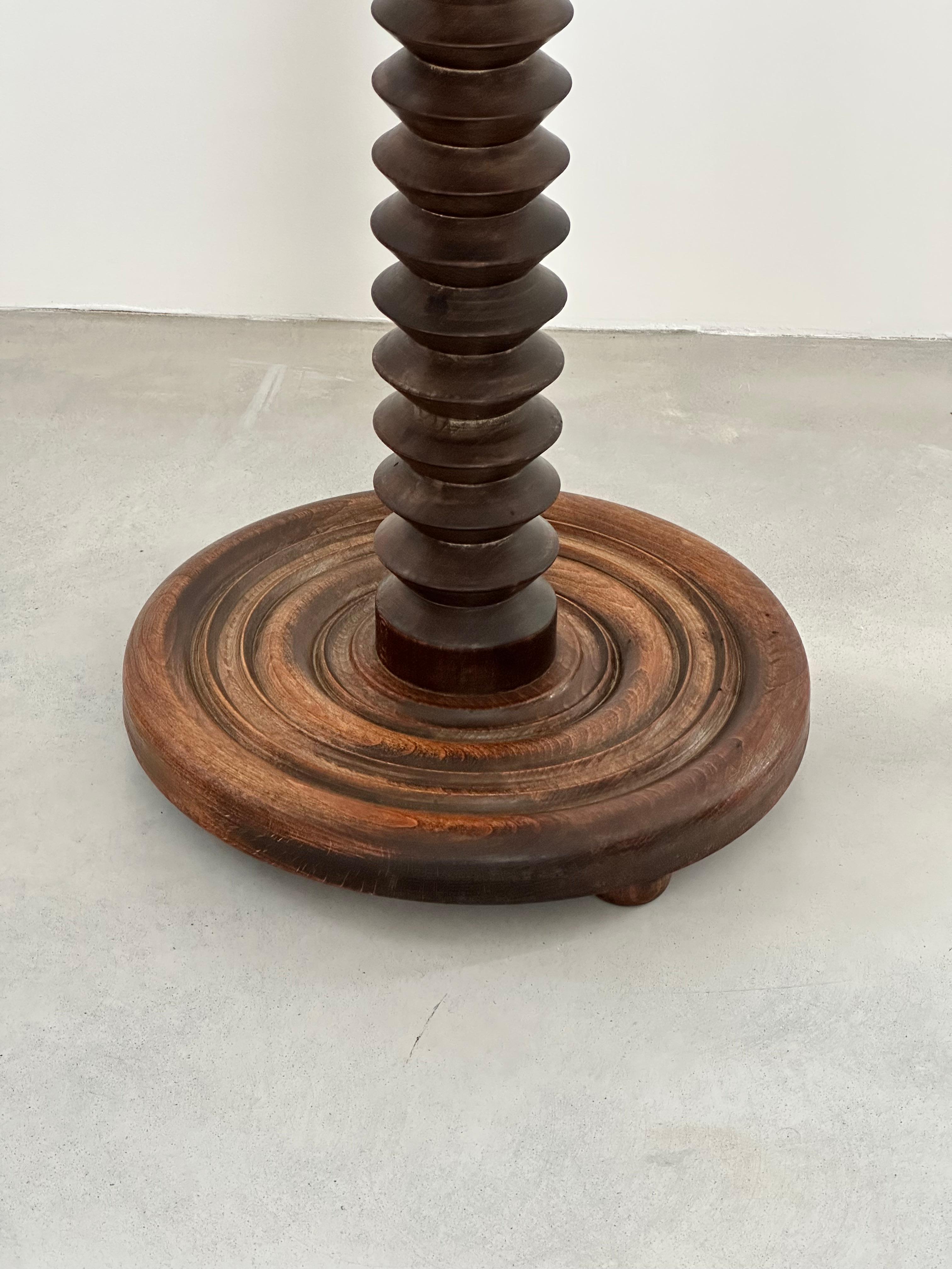 Rustic Charles Dudouyt oak circular pedestal or side table, France 1940s