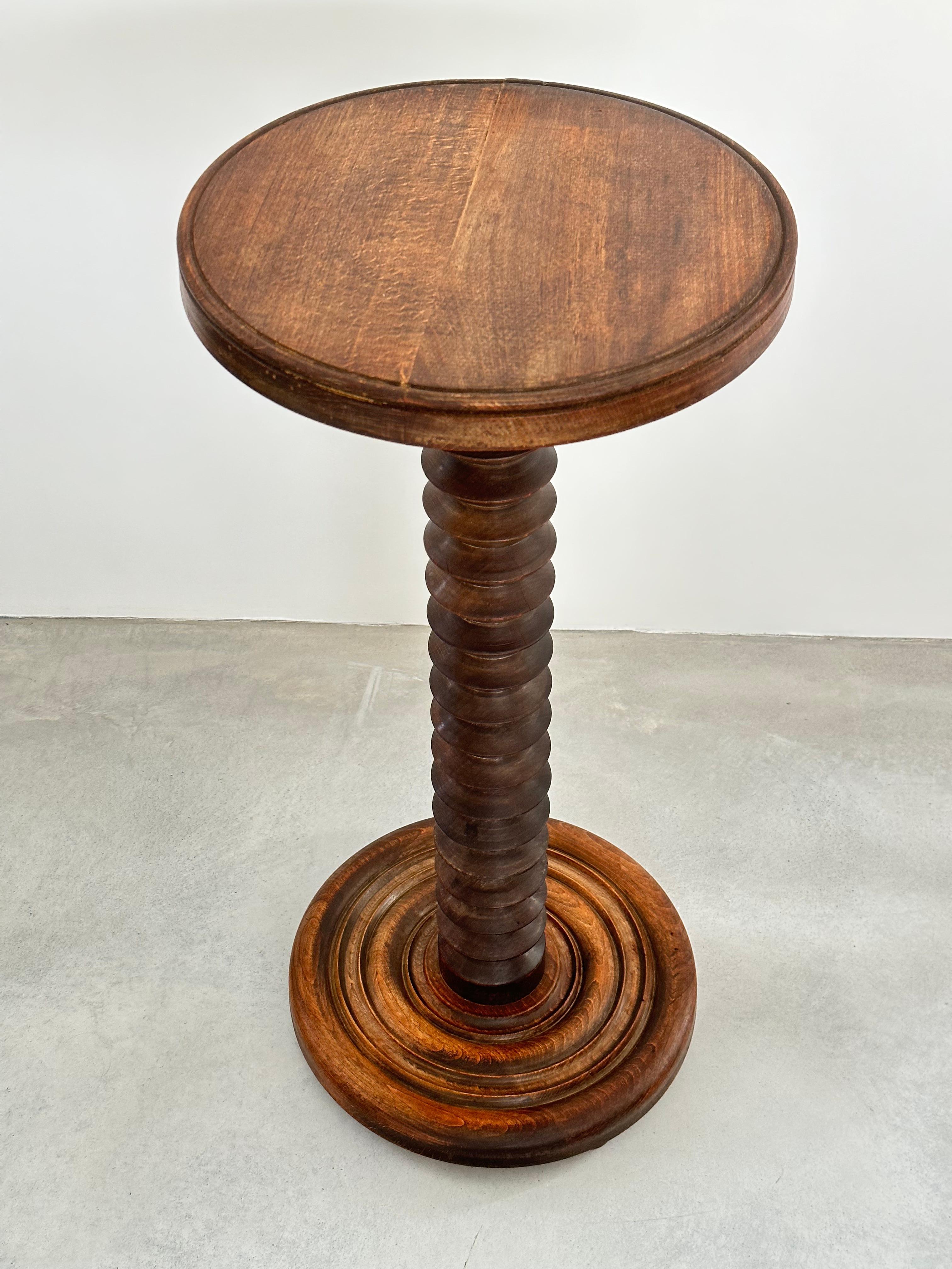 Mid-20th Century Charles Dudouyt oak circular pedestal or side table, France 1940s