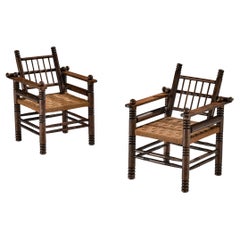 Paire de chaises longues Art Déco Charles Dudouyt avec assise en jonc