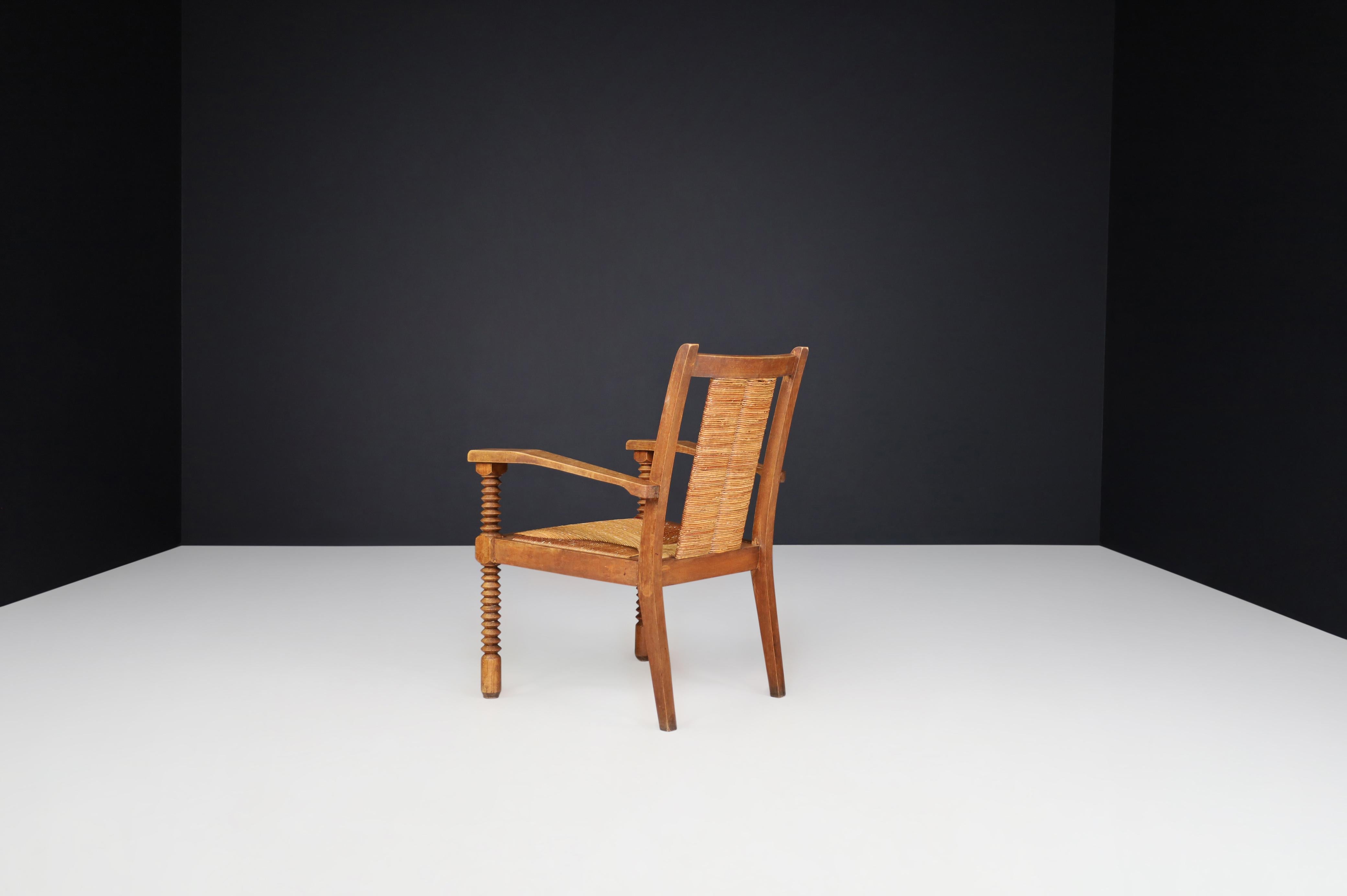 Charles Dudouyt Patinated Oak and Rush Armchairs, France 1940s For Sale 2