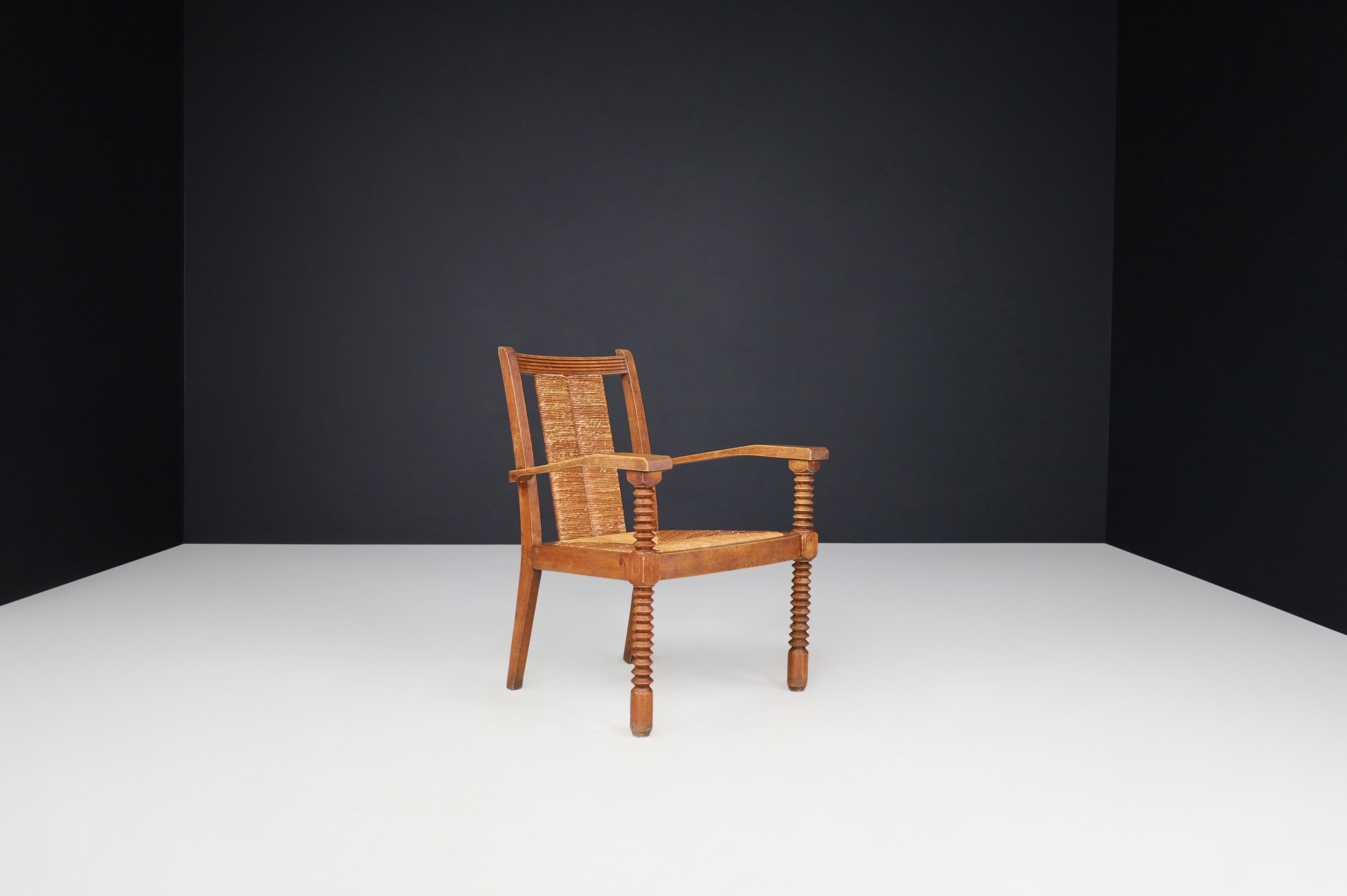 Charles Dudouyt Patinated Oak and Rush Armchairs, France 1940s For Sale 3