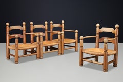 Charles Dudouyt Sculptural Walnut Armchairs with Rush Seats, France 1940s